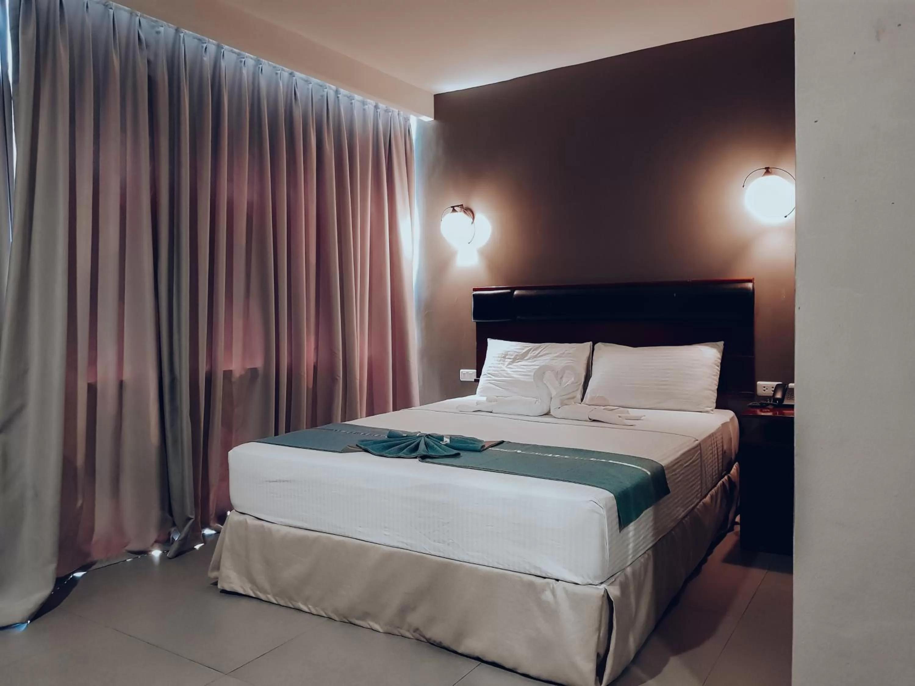 Bed in Dosi Hotel PH