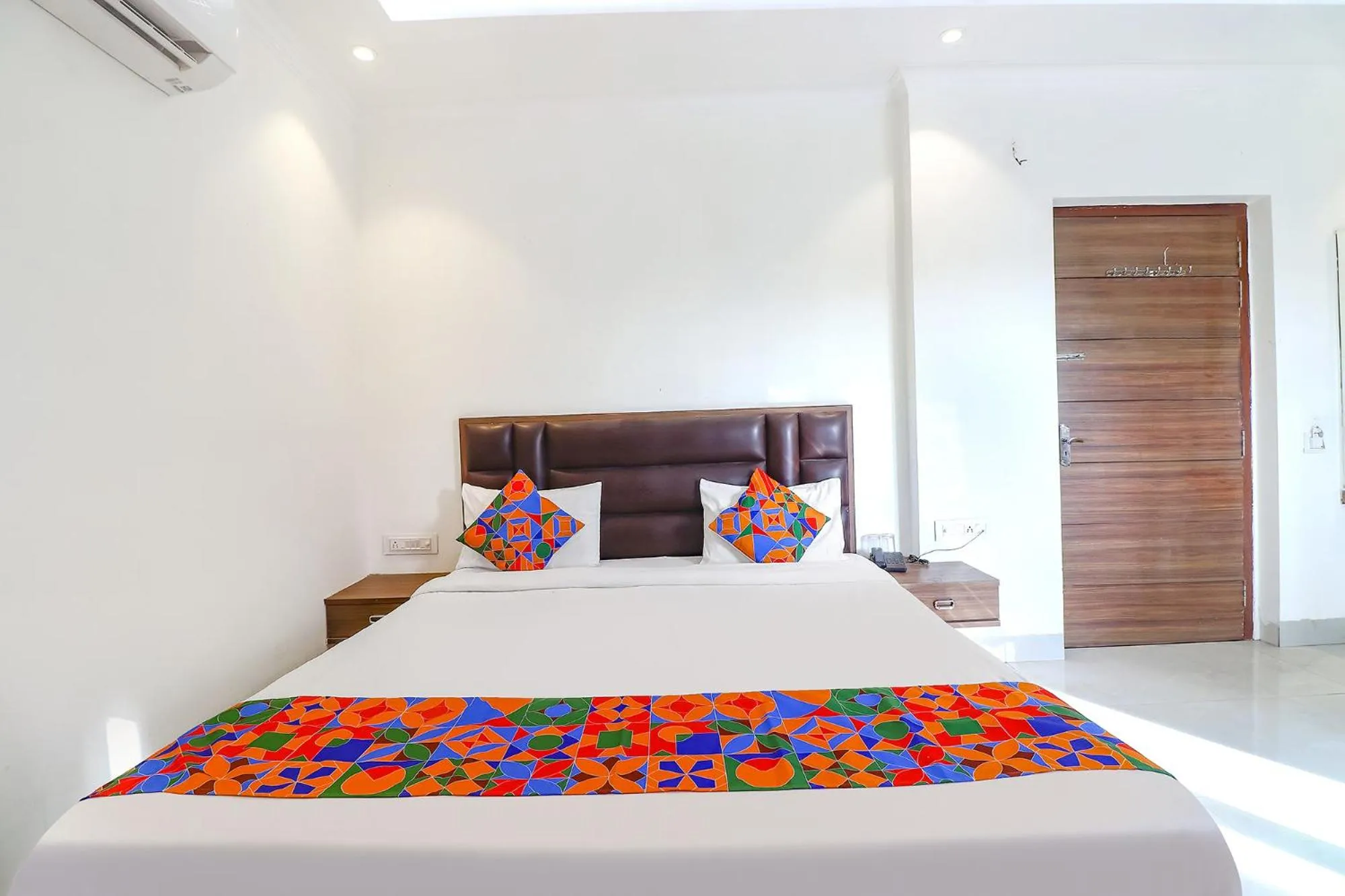 Bed in FabHotel Bhawana