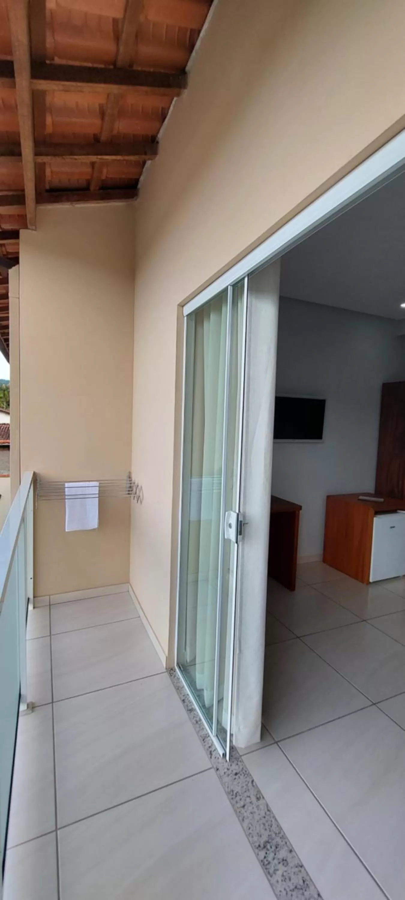 Balcony/Terrace, TV/Entertainment Center in Pousada das Saíras