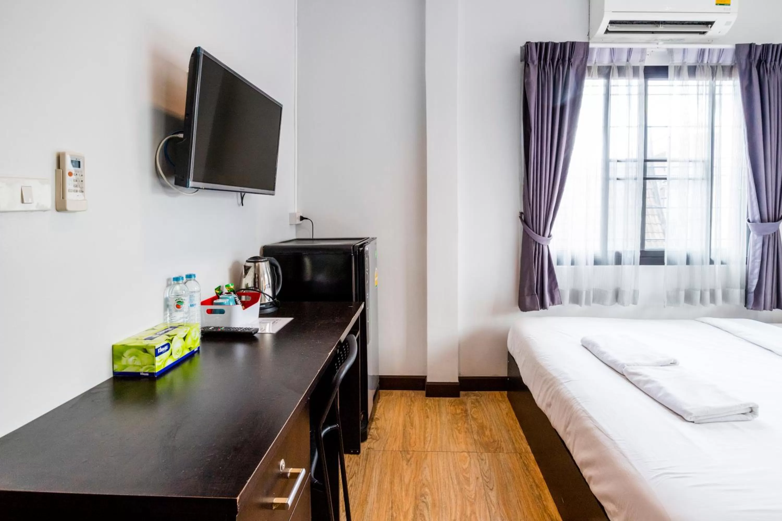 Bedroom, TV/Entertainment Center in The Cube Sathorn Boutique Hotel