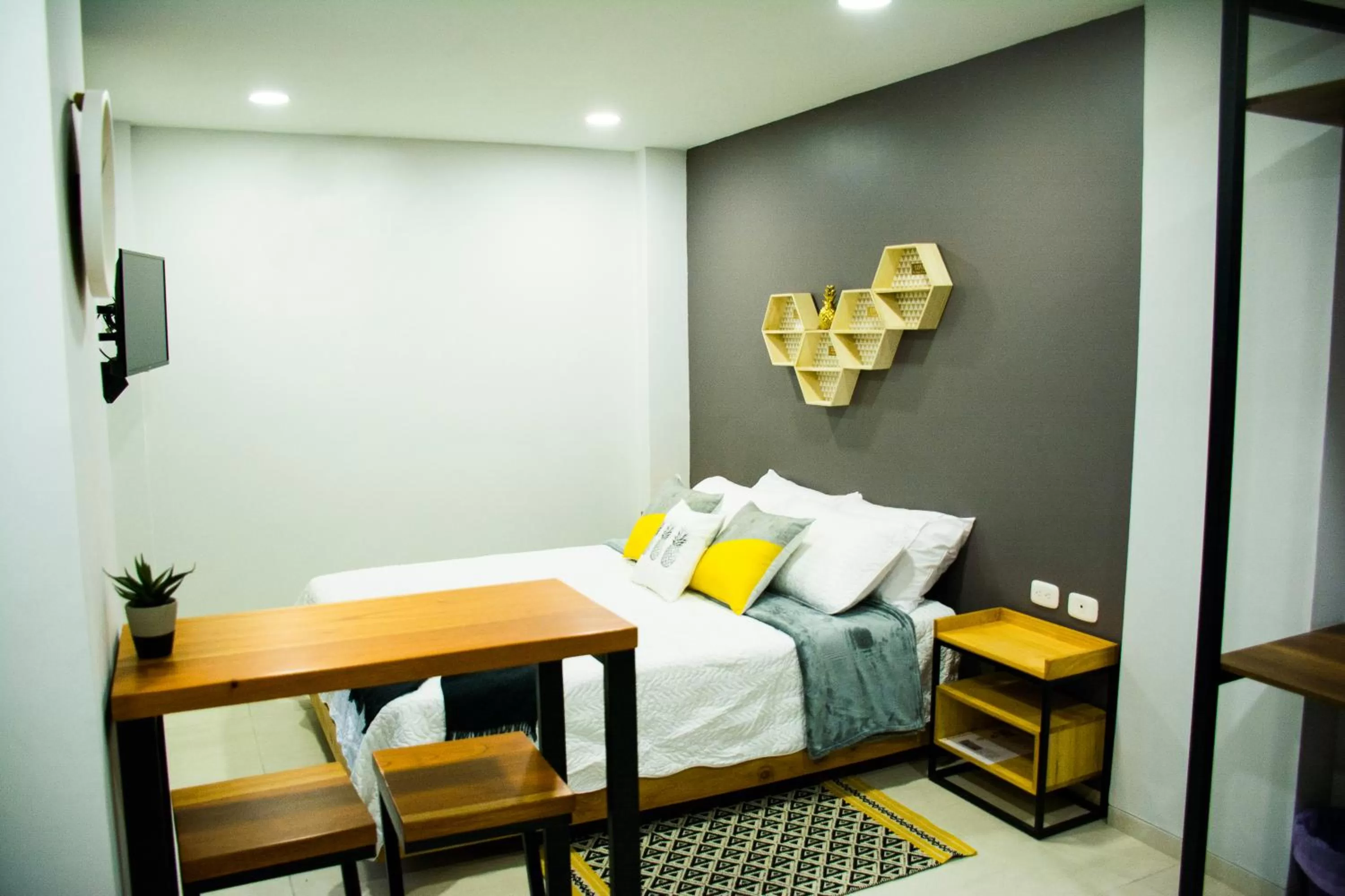 Bedroom, Seating Area in Kapital Suites