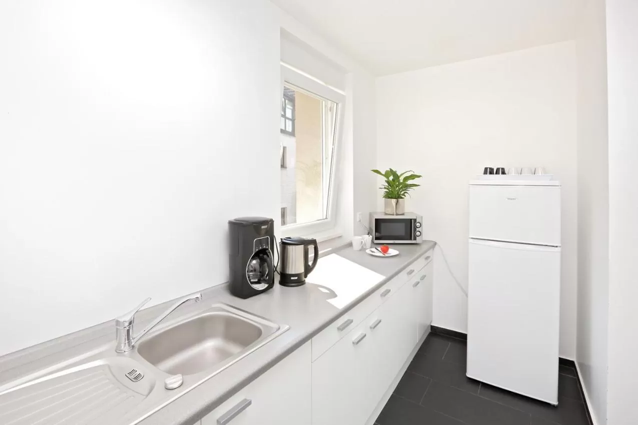 Kitchen or kitchenette, Kitchen/Kitchenette in Pension Arkade Heilbronn