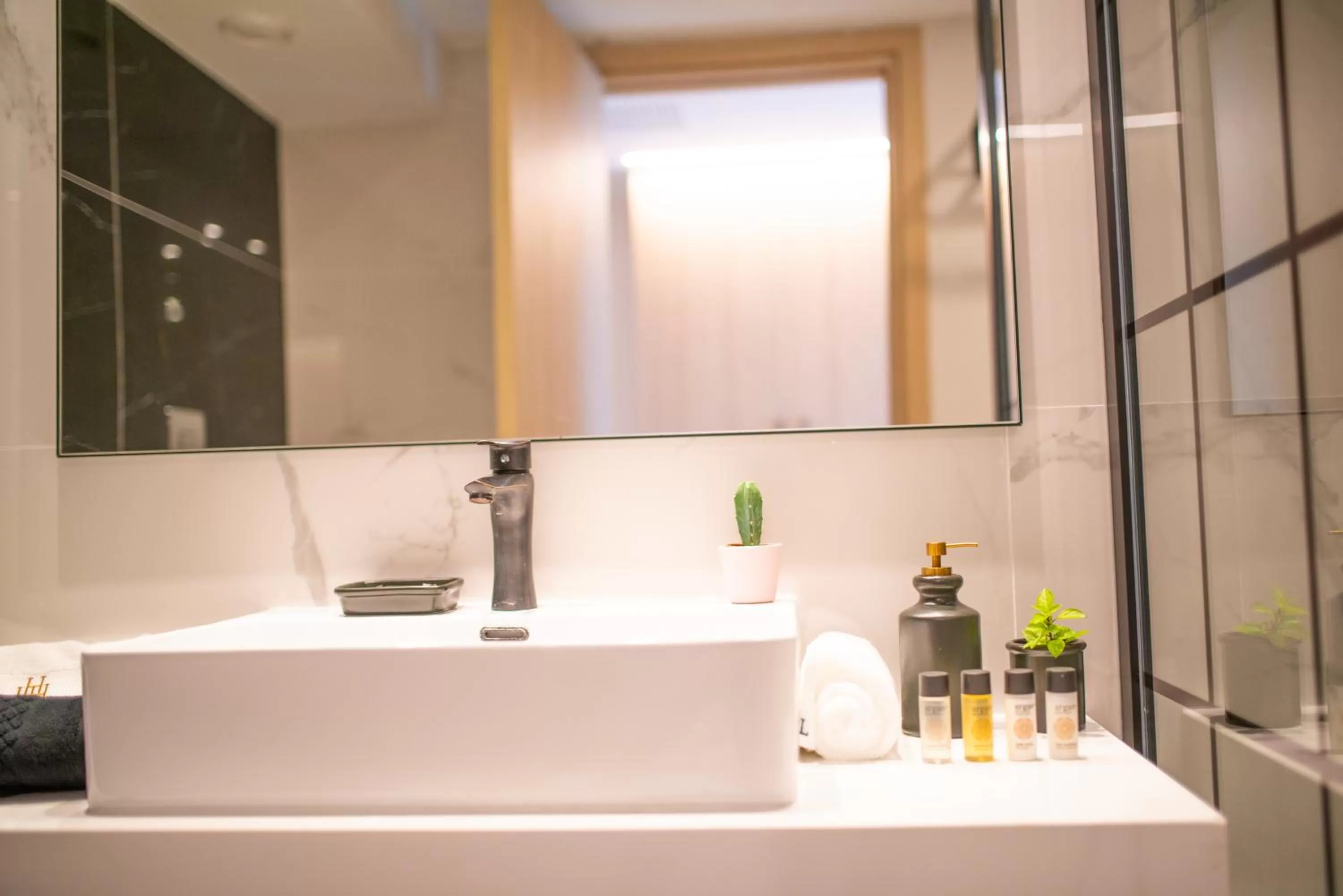 Bathroom in At Herbal Boutique Hotel & Spa