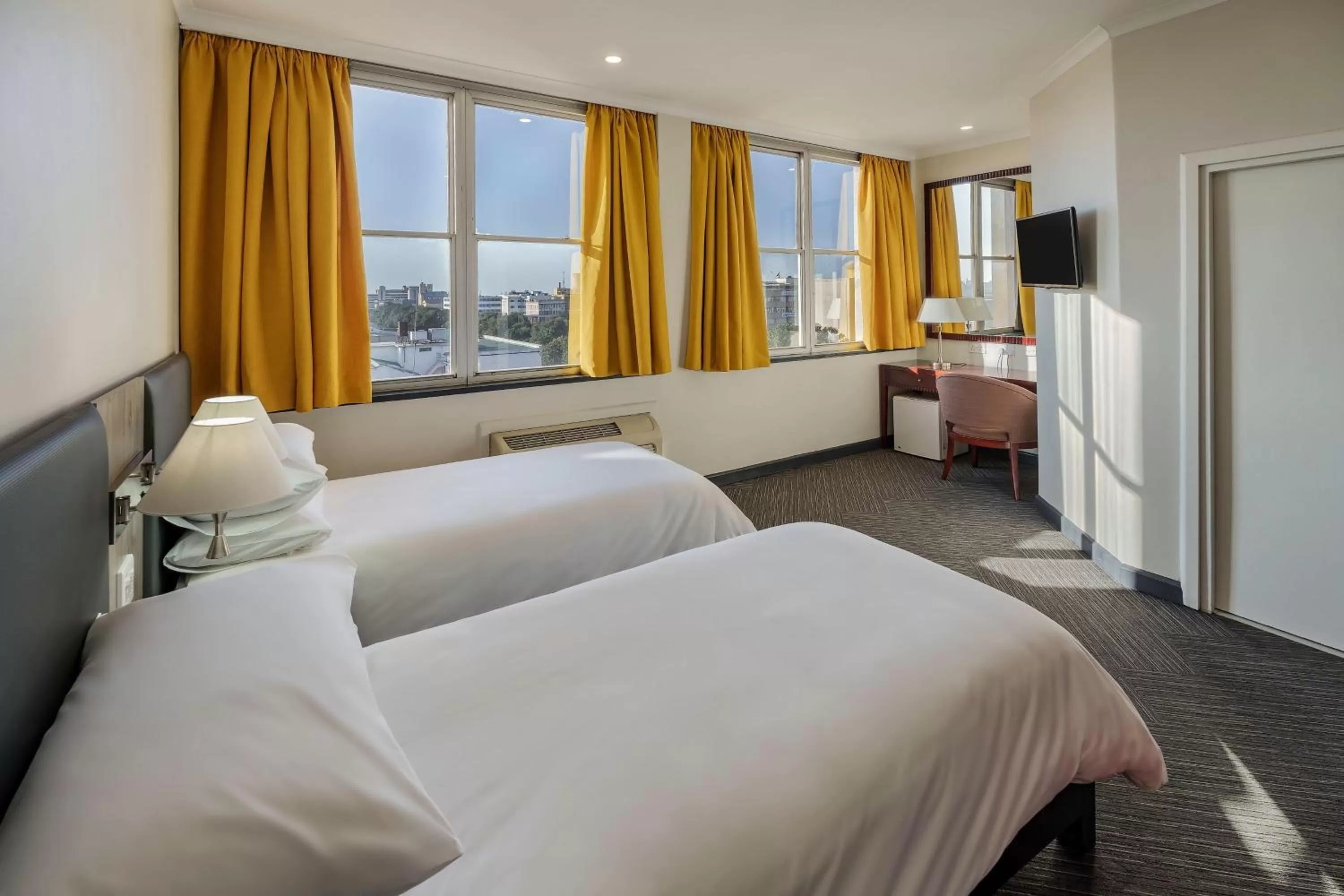 Photo of the whole room, Bed in Protea Hotel by Marriott Lusaka Cairo Road