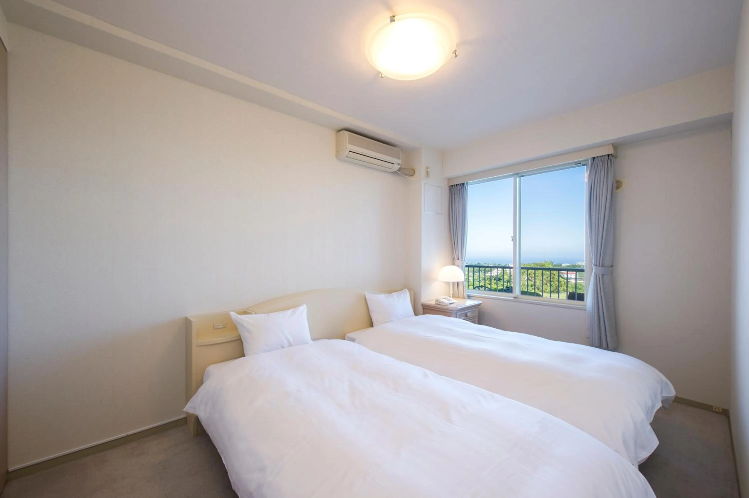 Bed in Hotel Village Izukogen