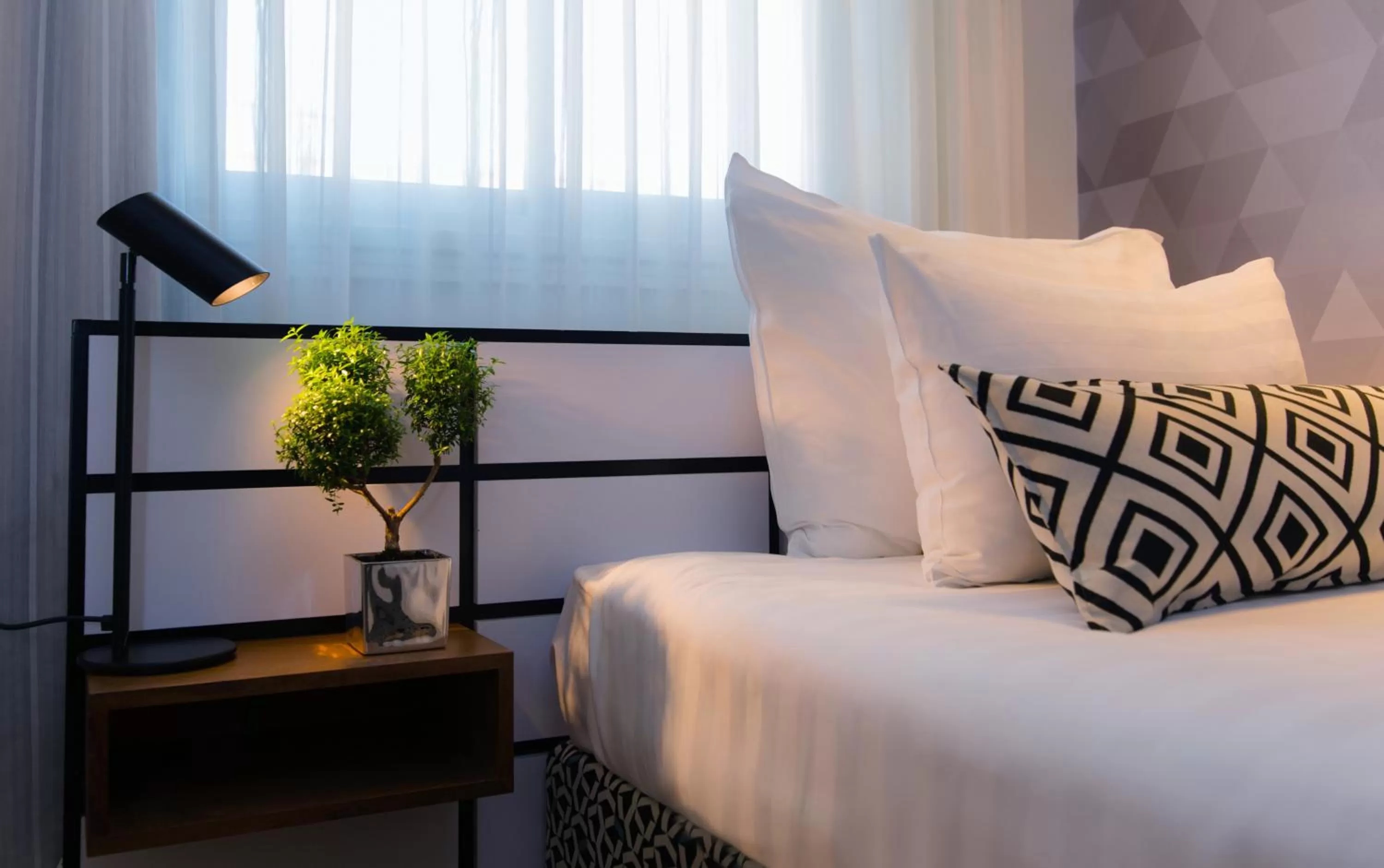 Bedroom, Bed in Prima Tel Aviv Hotel