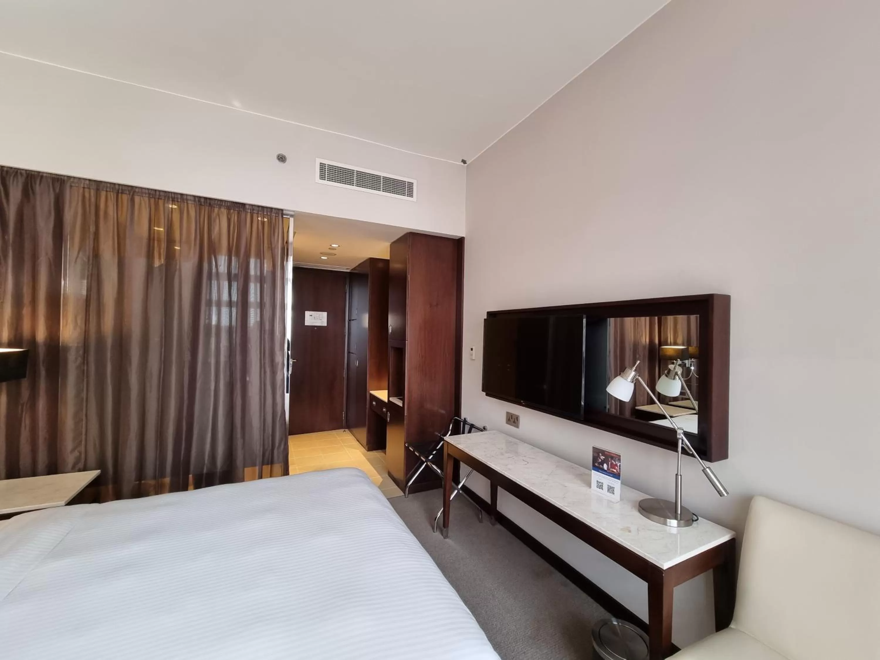 Bed in Centro Al Manhal by Rotana