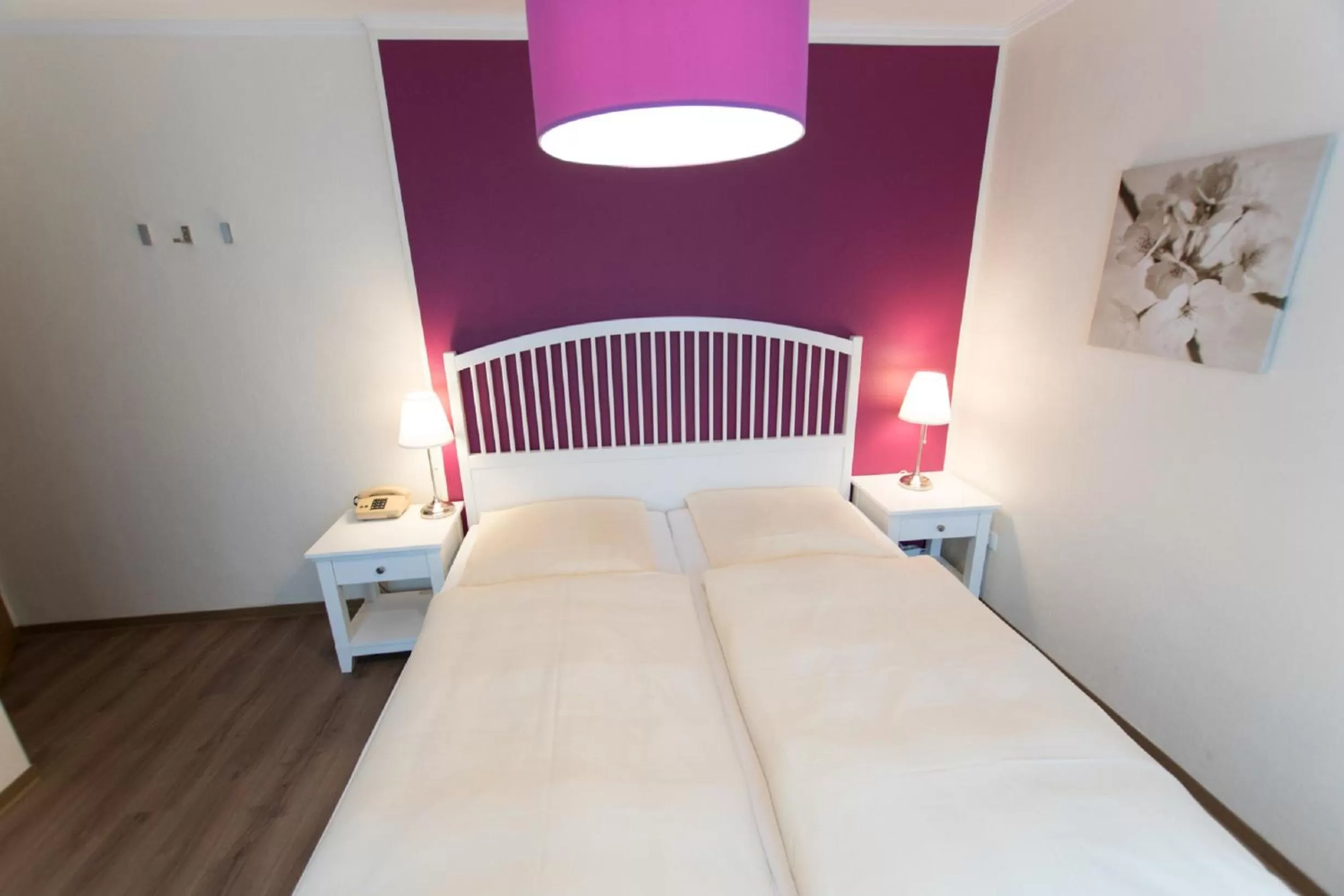 Bed in Hotel Heldt Dependance