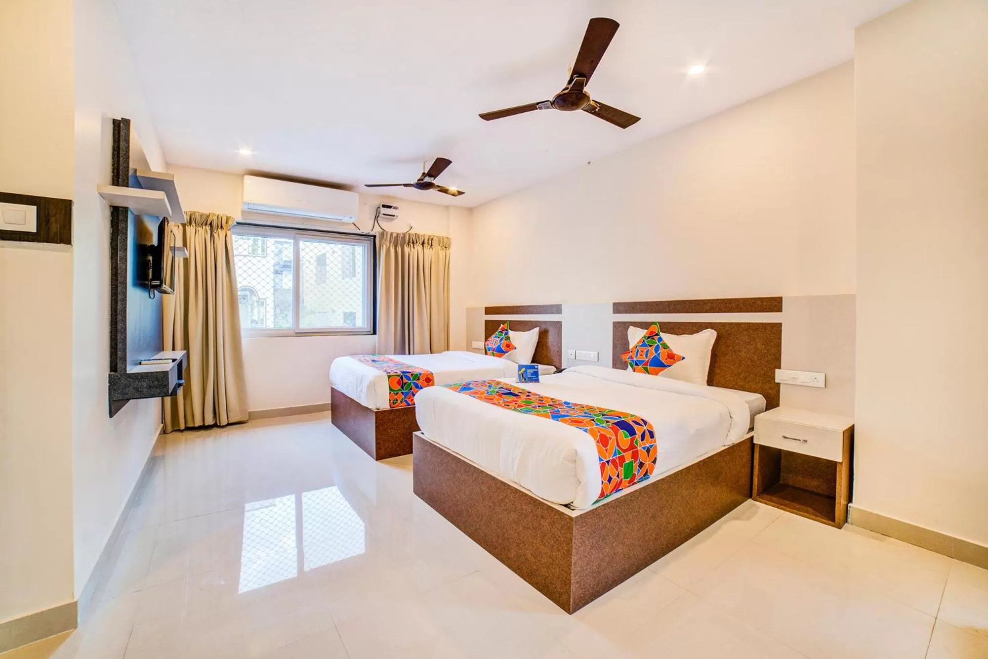 Bedroom in FabHotel Spark Inn Dwarakanagar