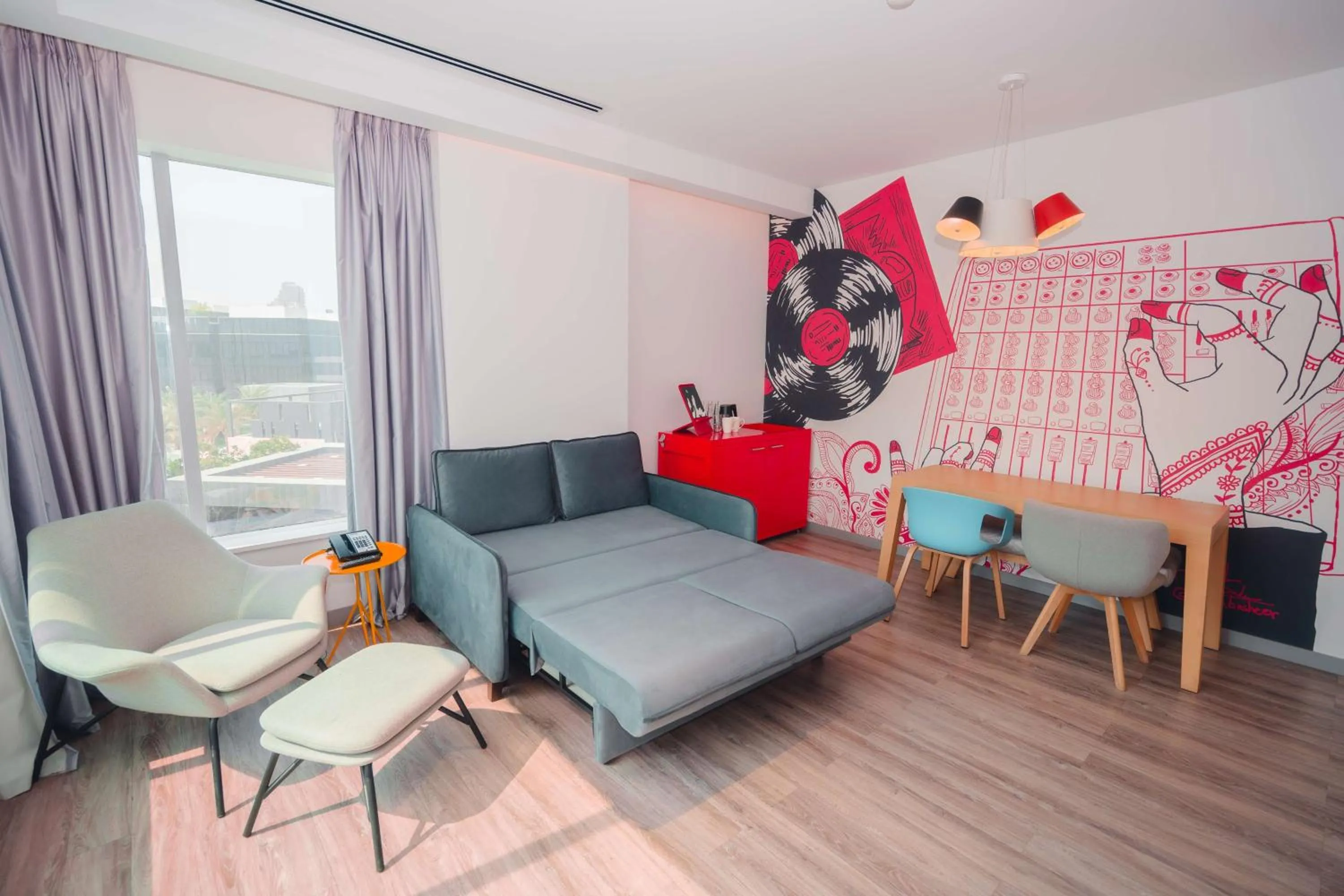 Photo of the whole room in Radisson RED Dubai Silicon Oasis