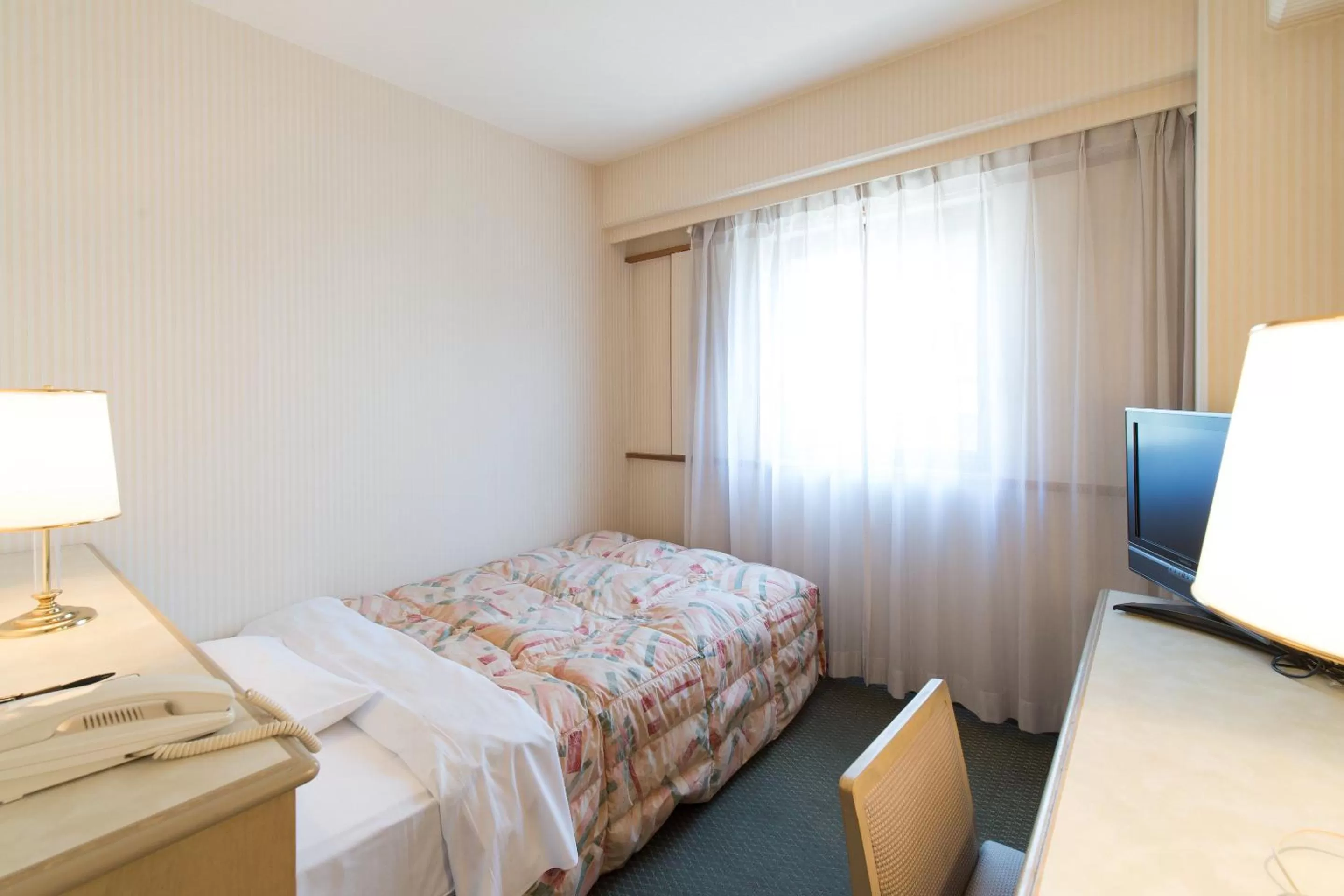 Photo of the whole room, Bed in Tabist Hotel Tetora Kitakyushu