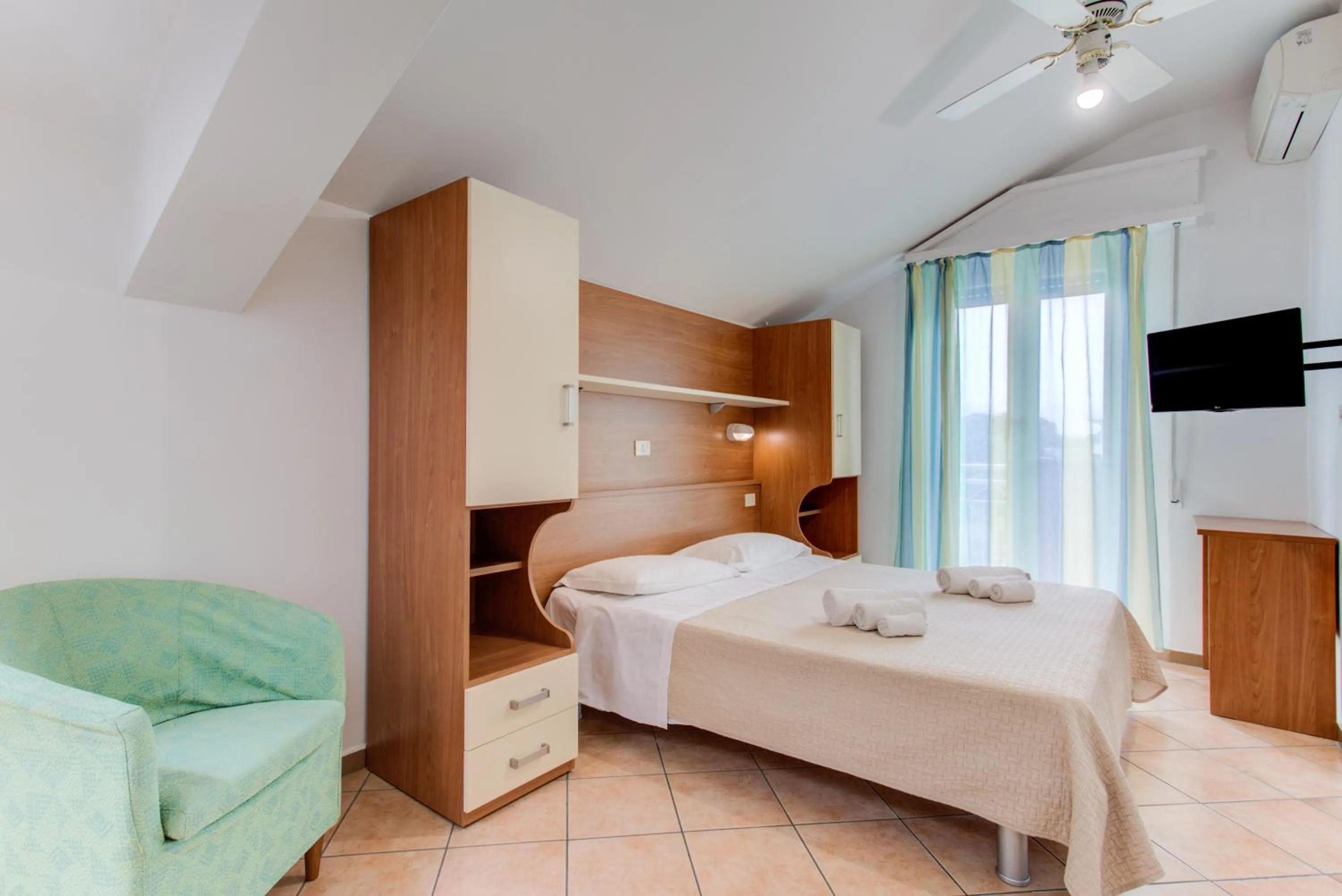 Bed in Hotel Cimarosa