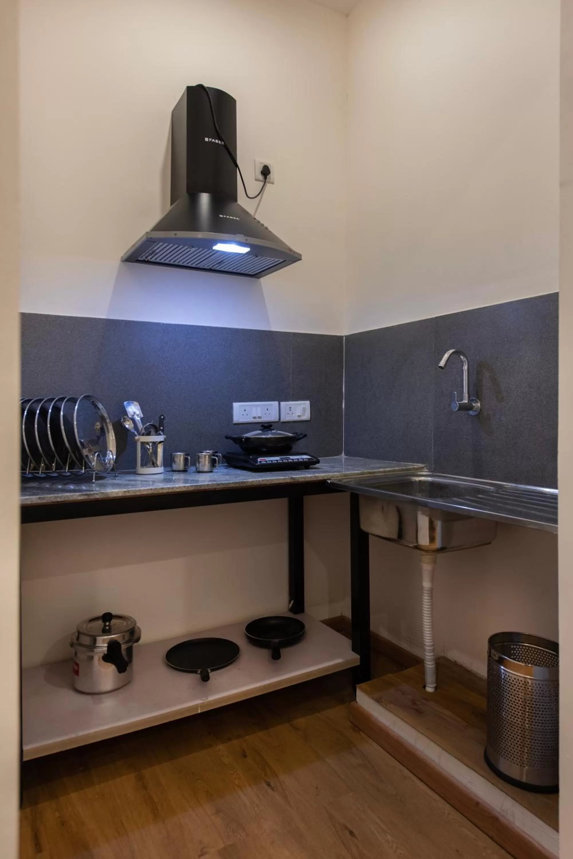 Kitchen/Kitchenette in Convastay Prestige- Near Apollo Hospital & US Consulate