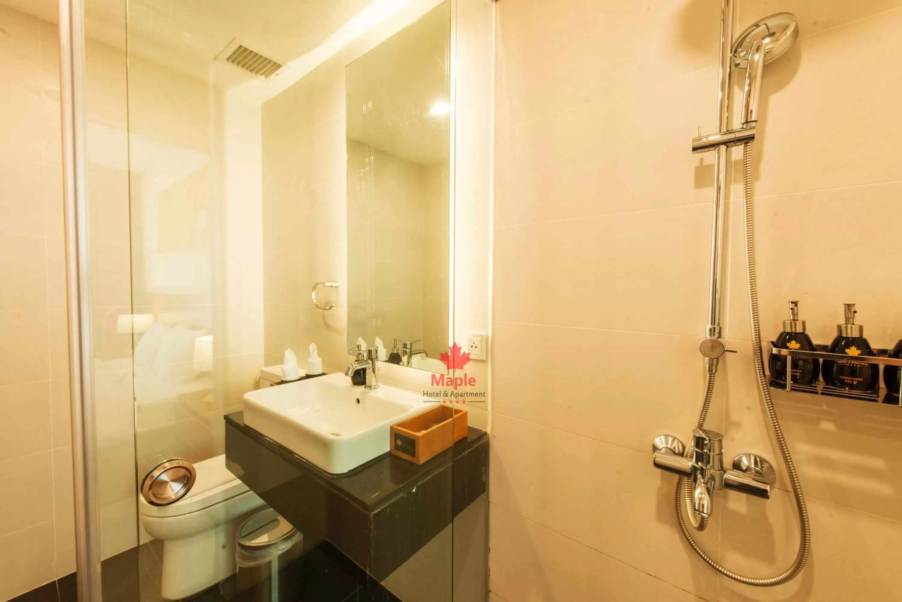 Shower in Maple Hotel & Apartment