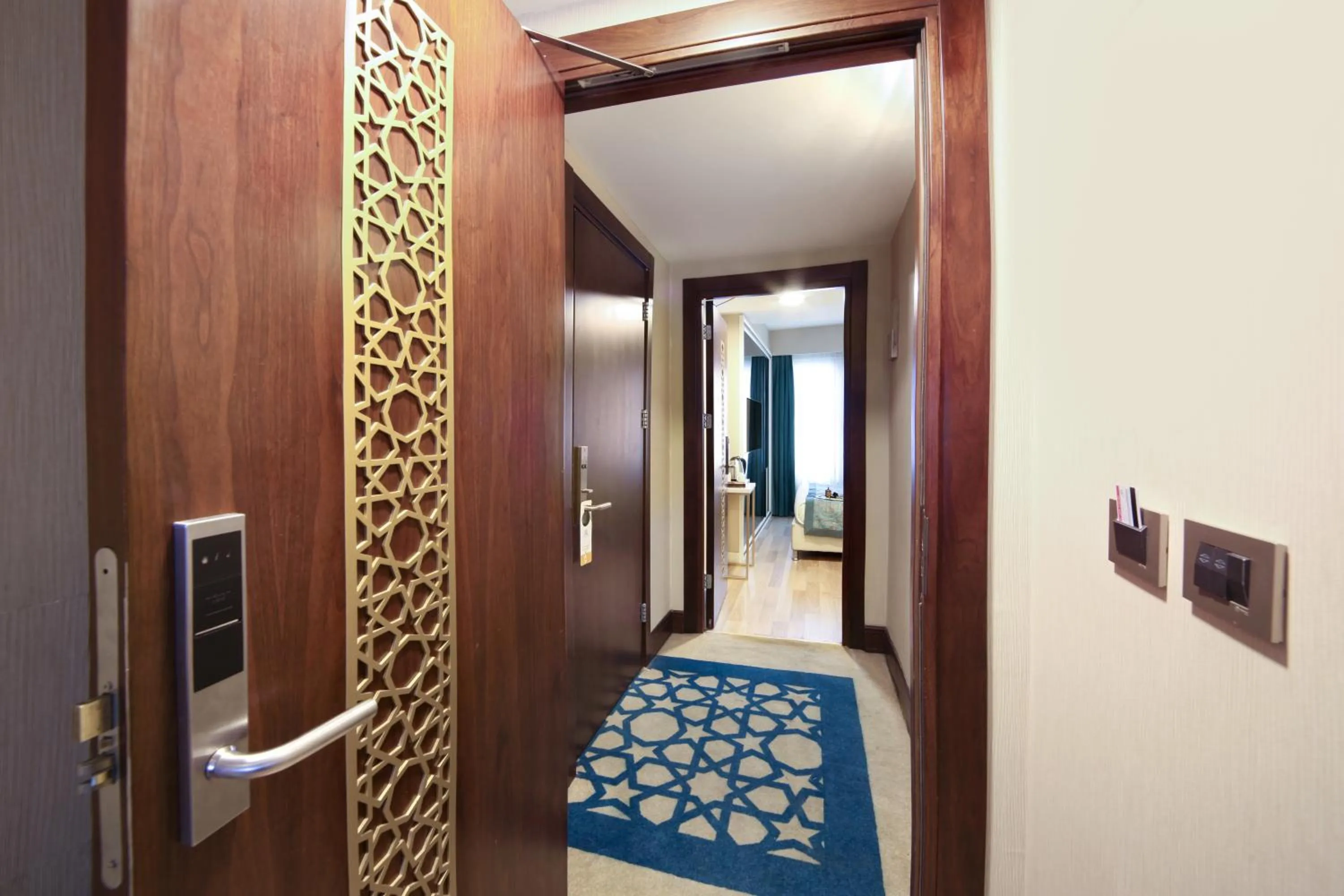 Communal lounge/ TV room, Bathroom in Great Fortune Hotel & Spa