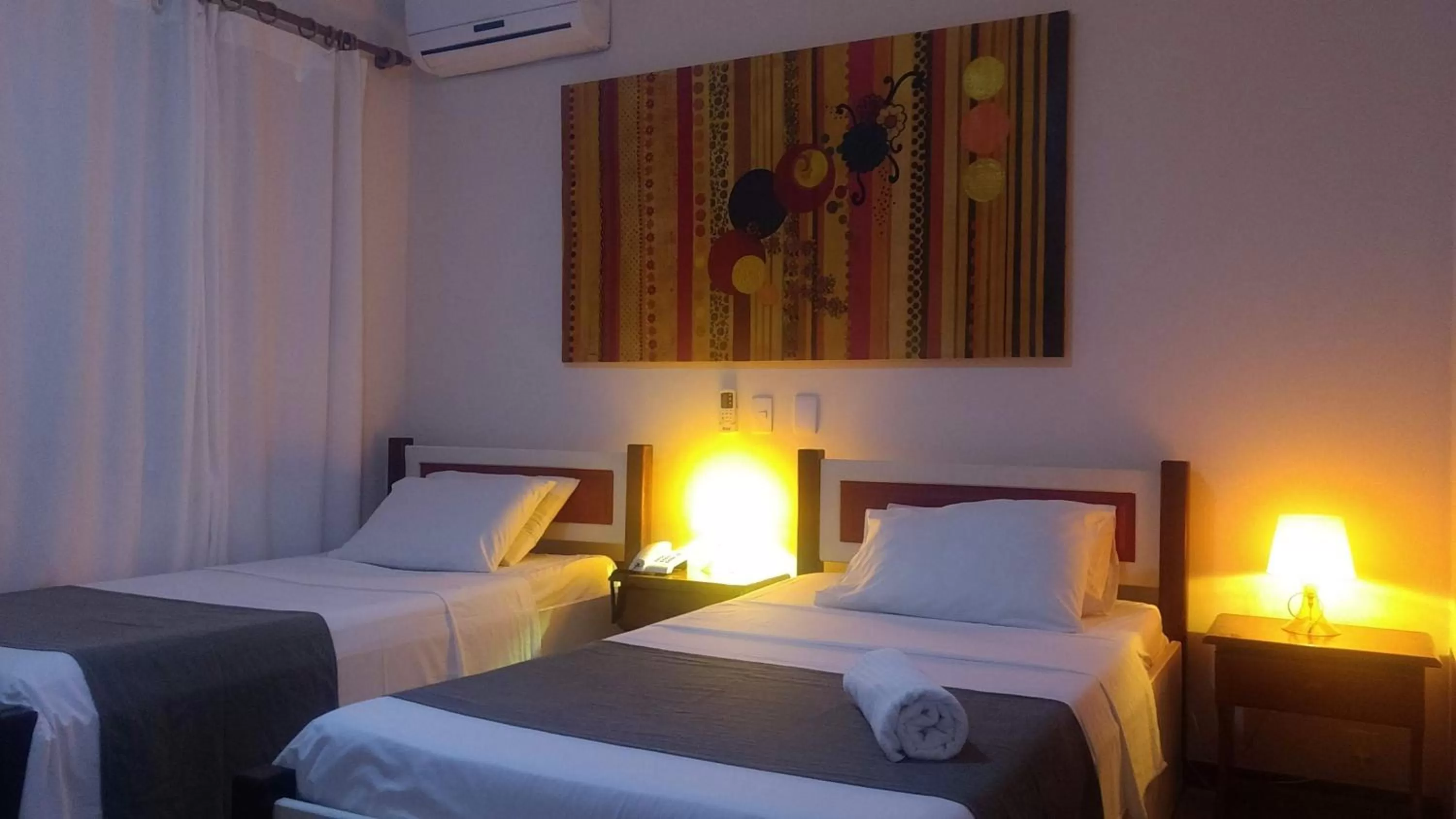 Bed in Hotel Pousada Salvador Paradise