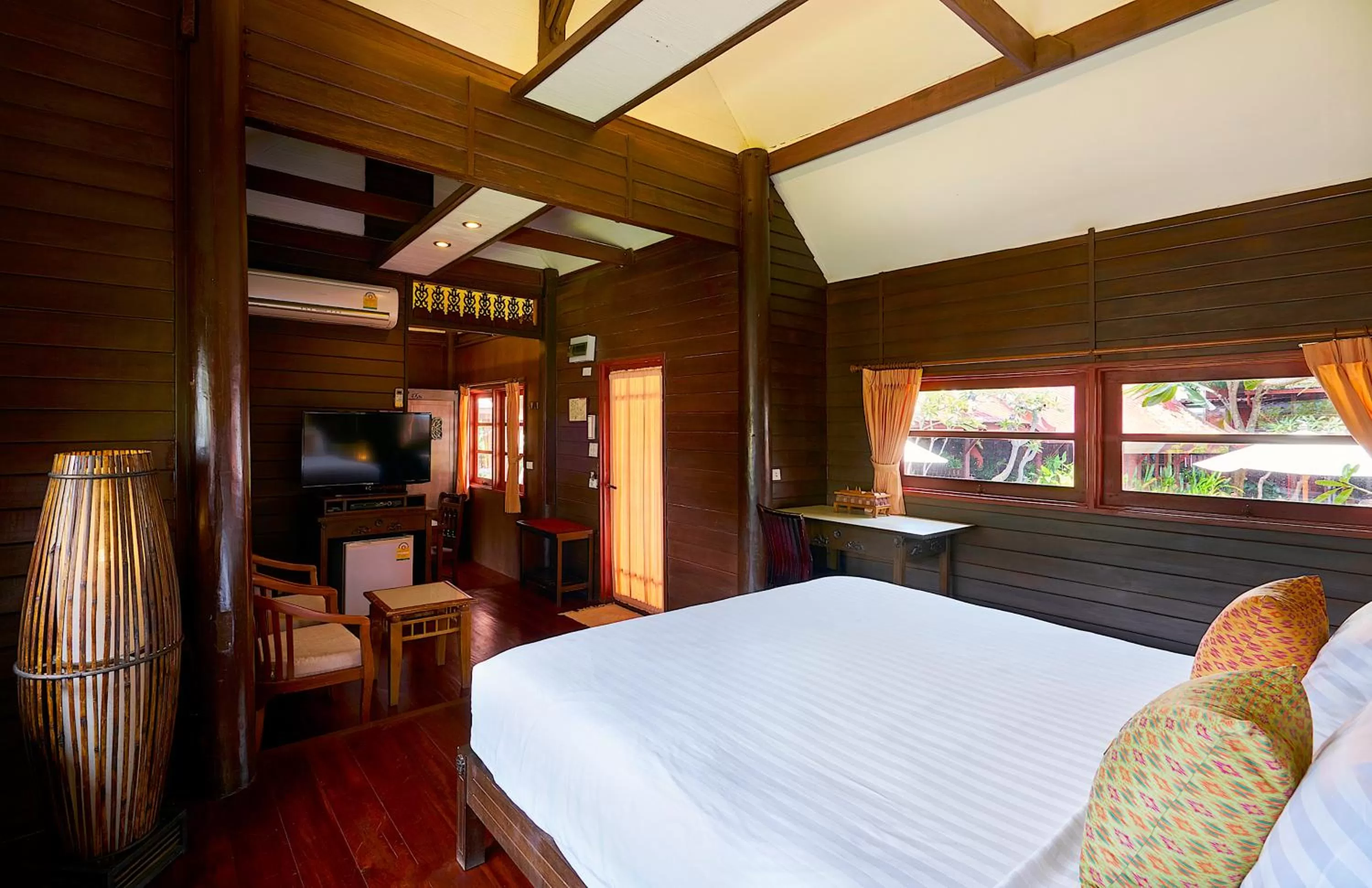 Bed in Ruenkanok Thaihouse Resort
