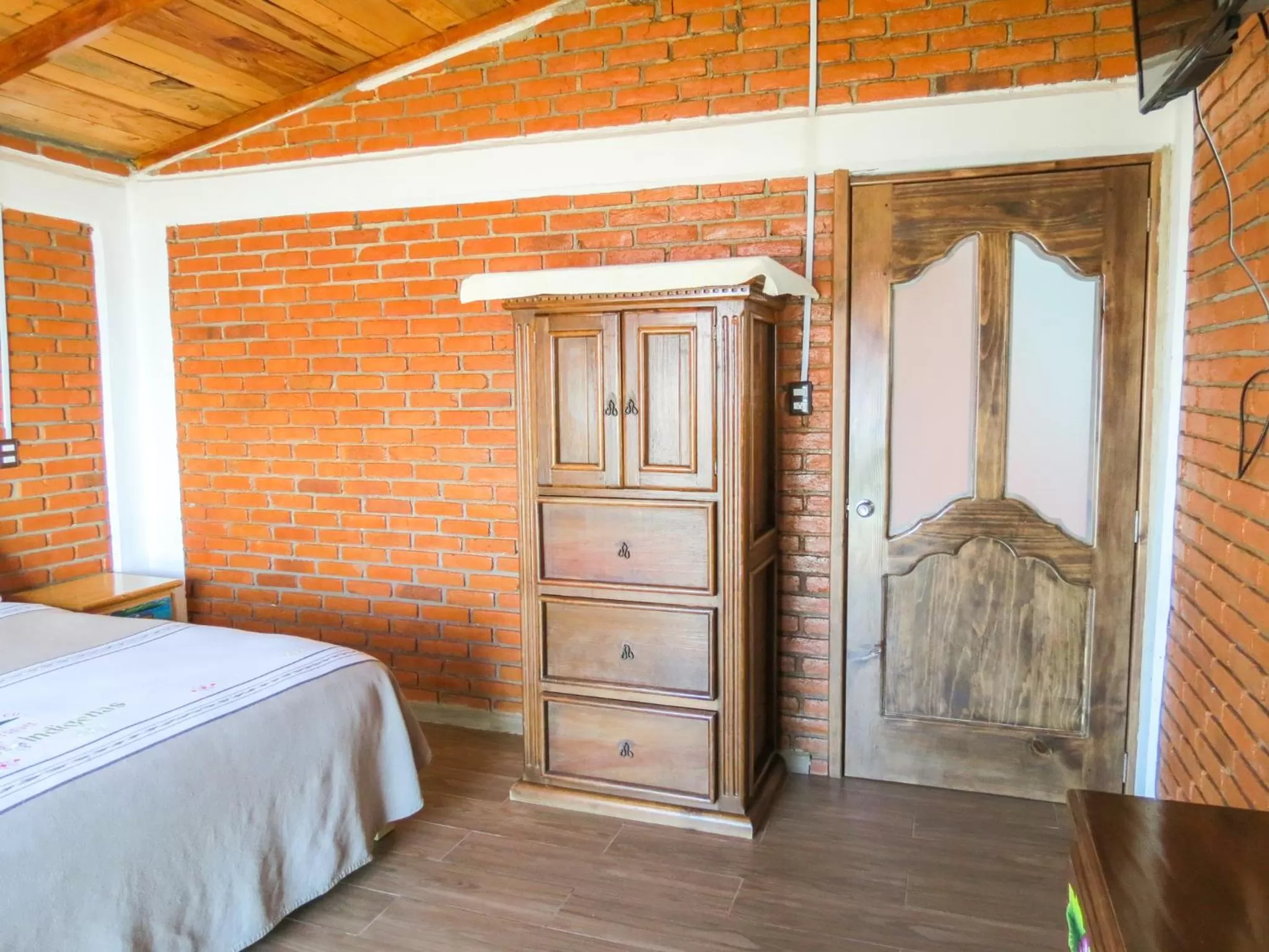 Bed in Cabañas Yunuén by Rotamundos