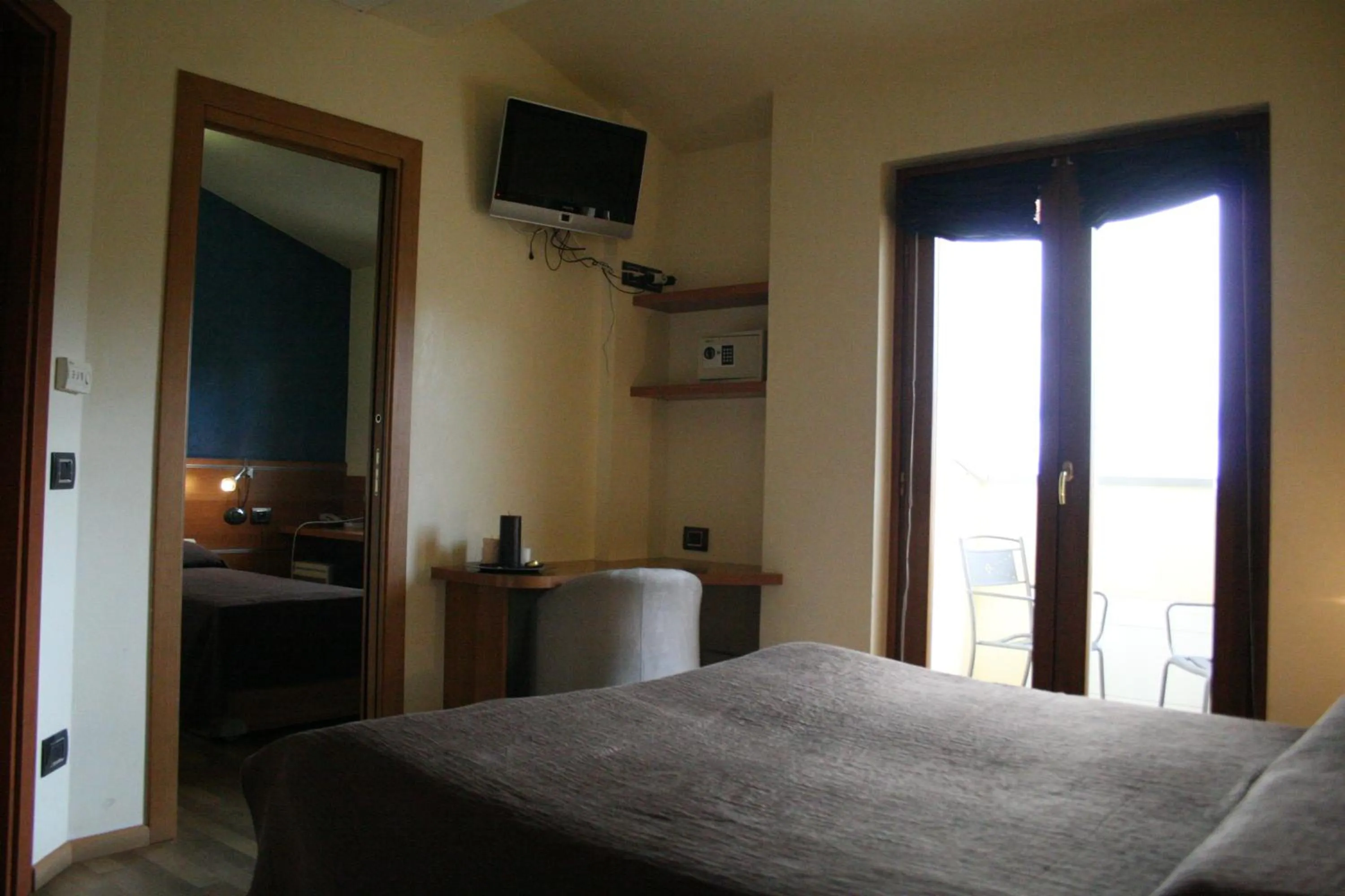 Bed in Hotel La Meridiana