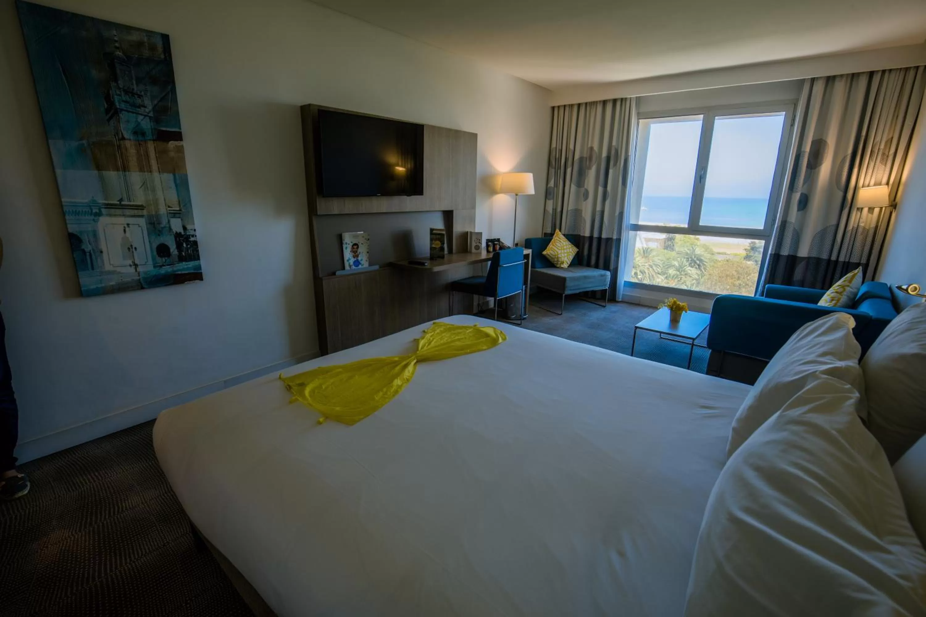 Seating area, Bed in Novotel Mohammedia