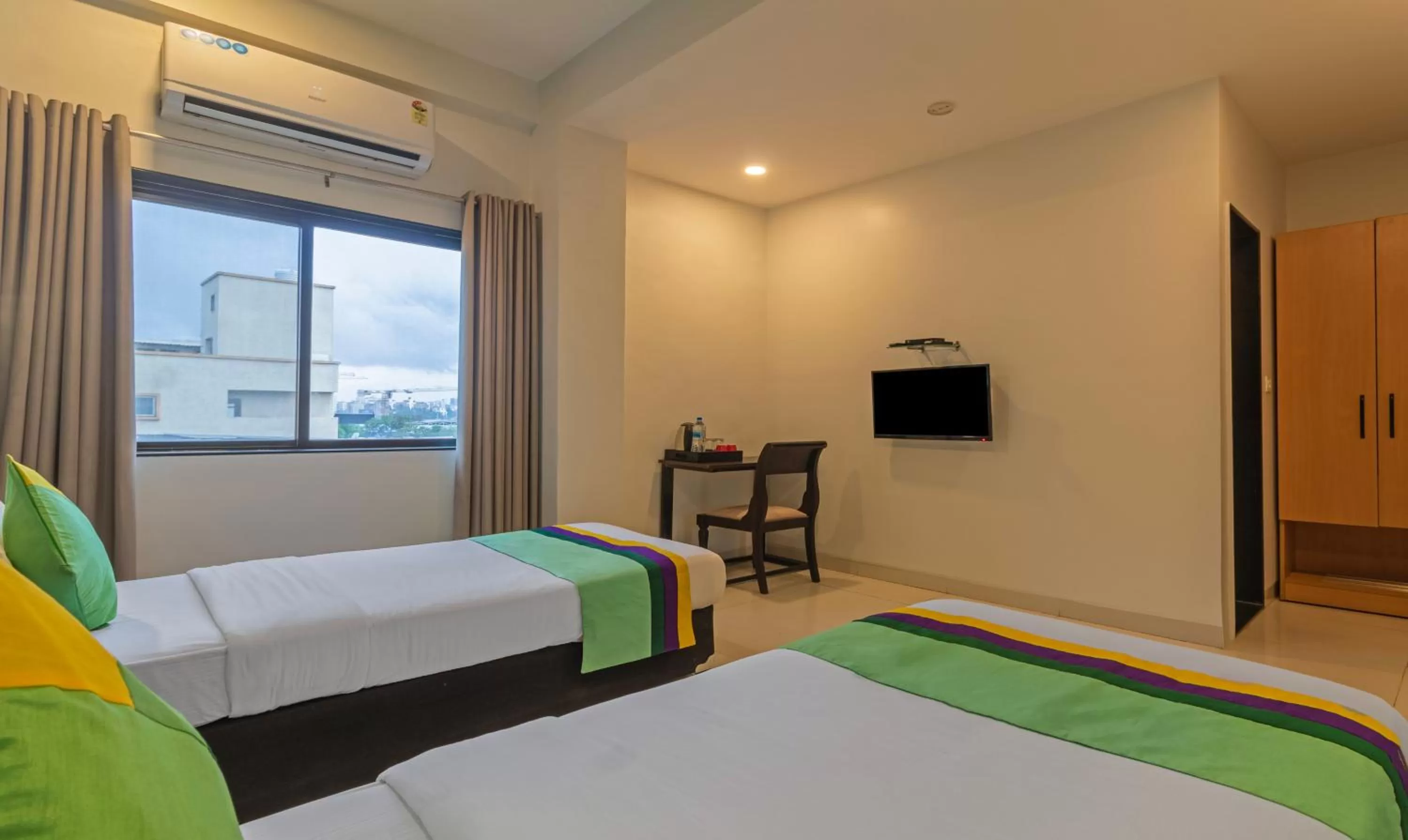 Bedroom, Bed in Treebo Tulip Comfort