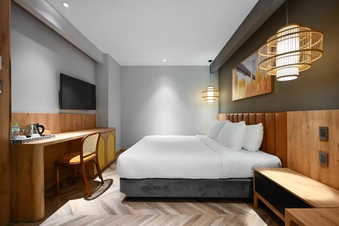 Bedroom in La Opera Saigon Hotel