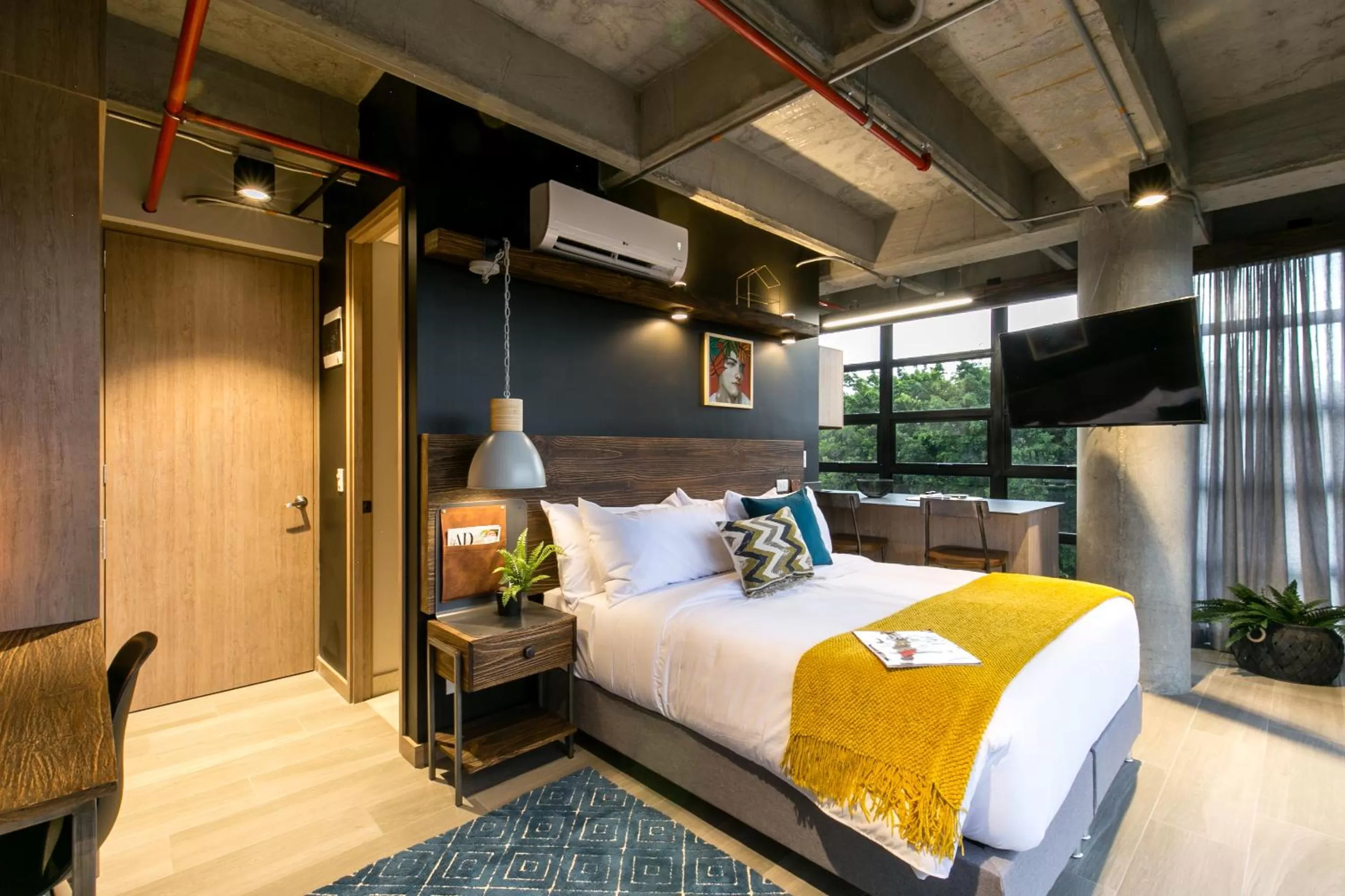 Bed in Factory Lofts Hotel