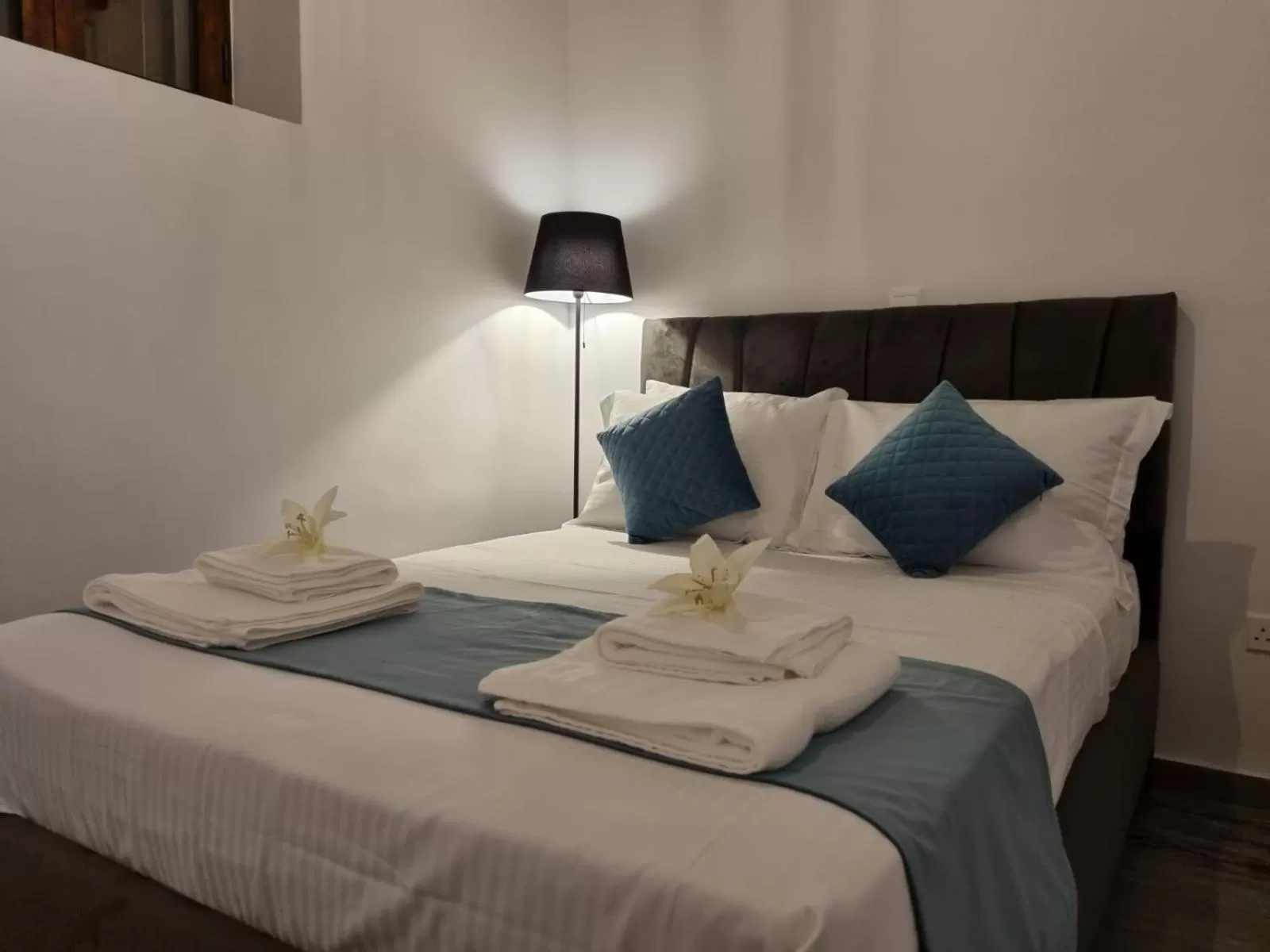 Bed in Kamaroporta Luxury Apartments