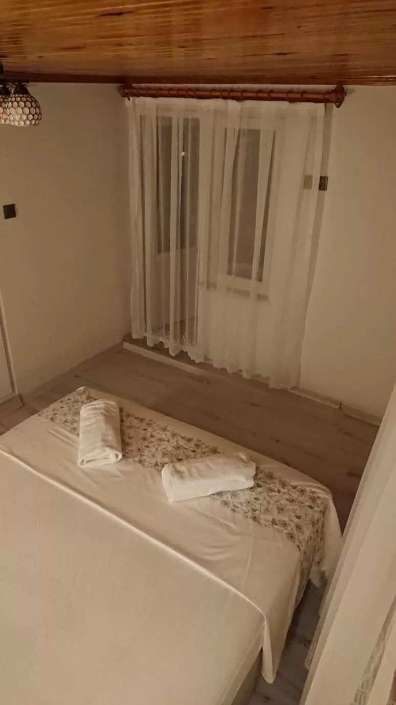 Bed in Ali's Pension