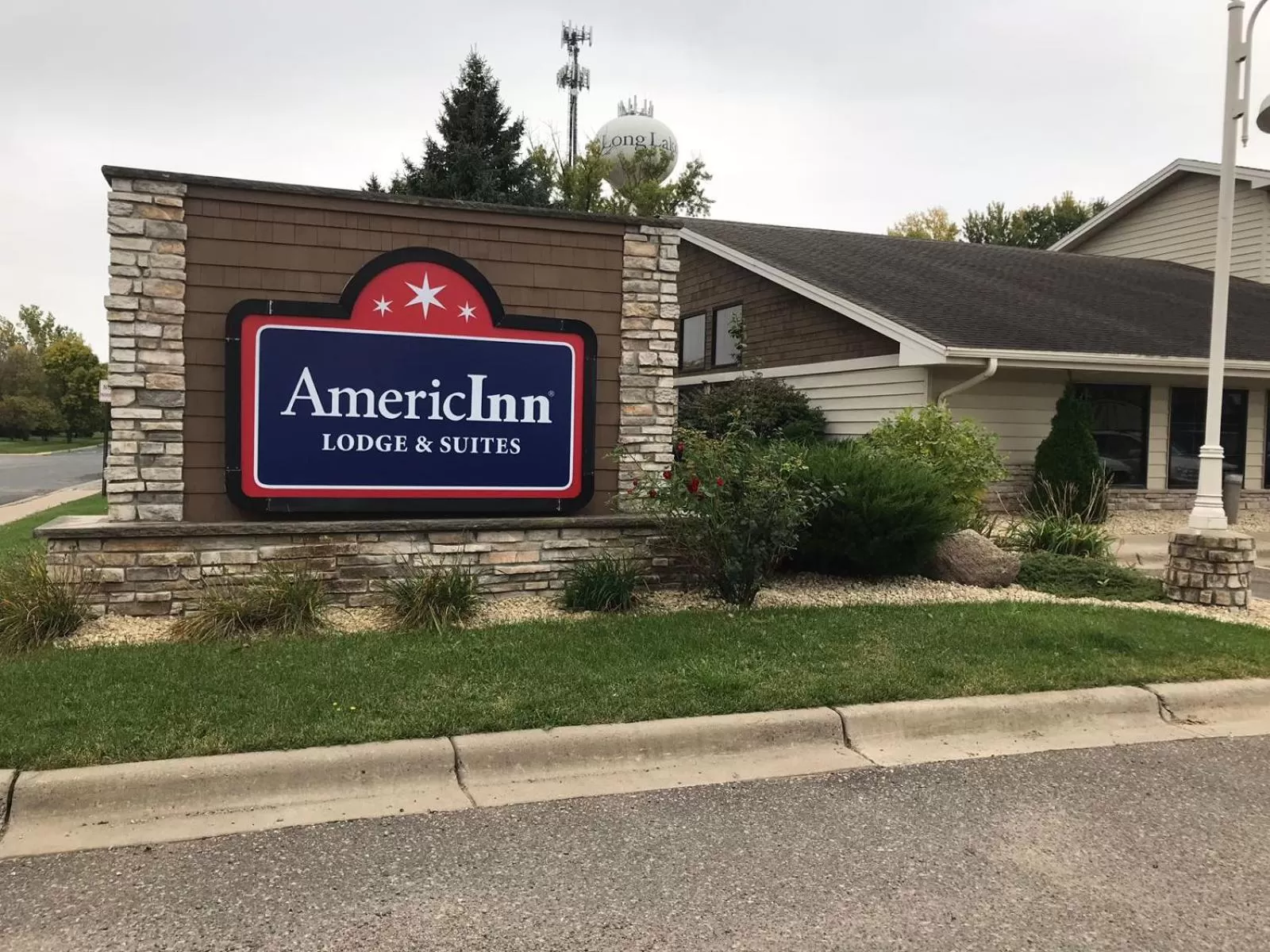Property logo or sign in AmericInn by Wyndham Hotel and Suites Long Lake
