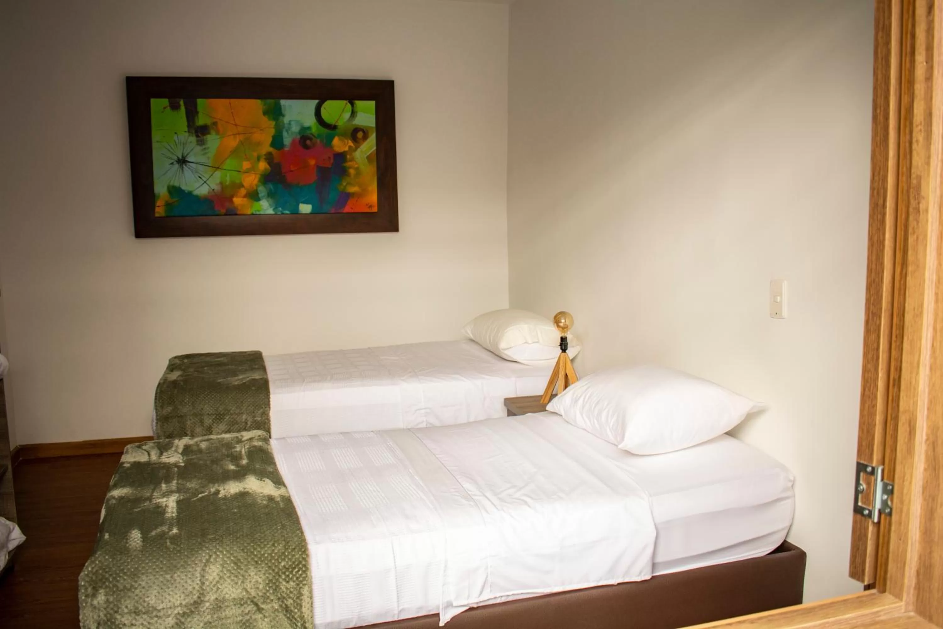 Bed in El Reloj Casa Hotel