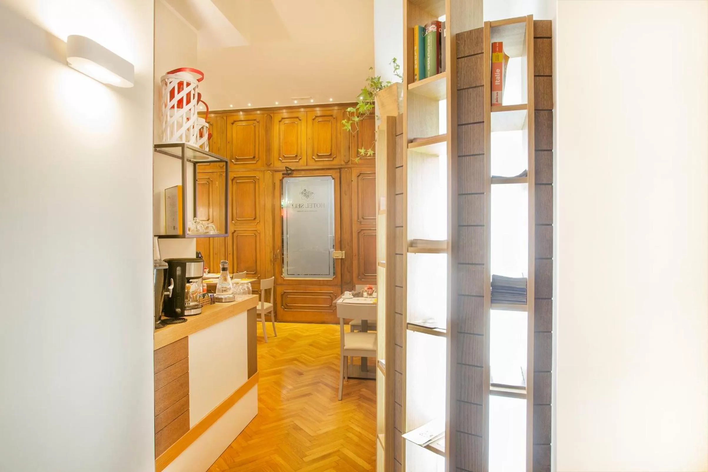 Communal lounge/ TV room in B&B Palazzo Depretis