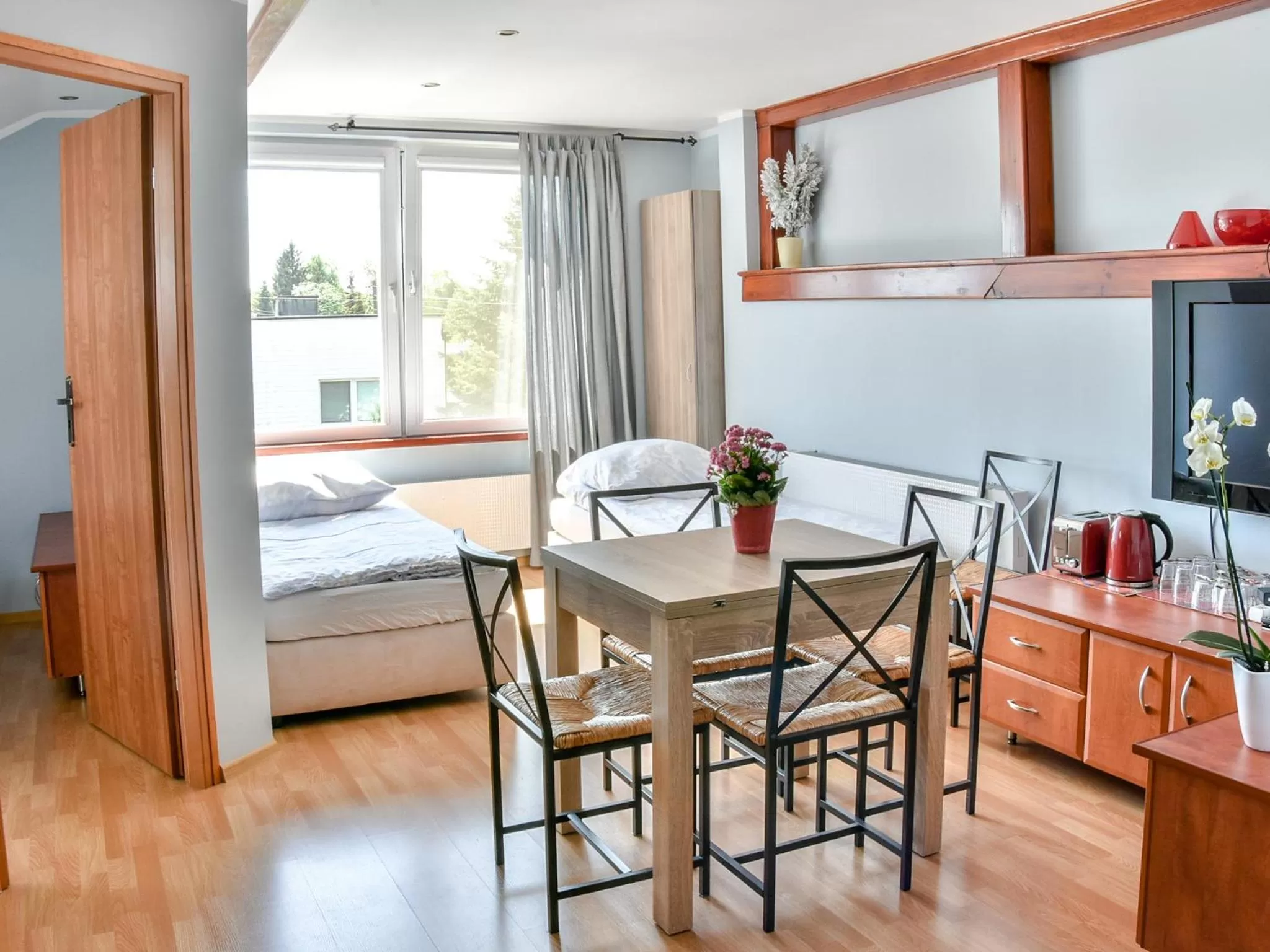 Bed, Dining Area in Gościniec Pod Markizami