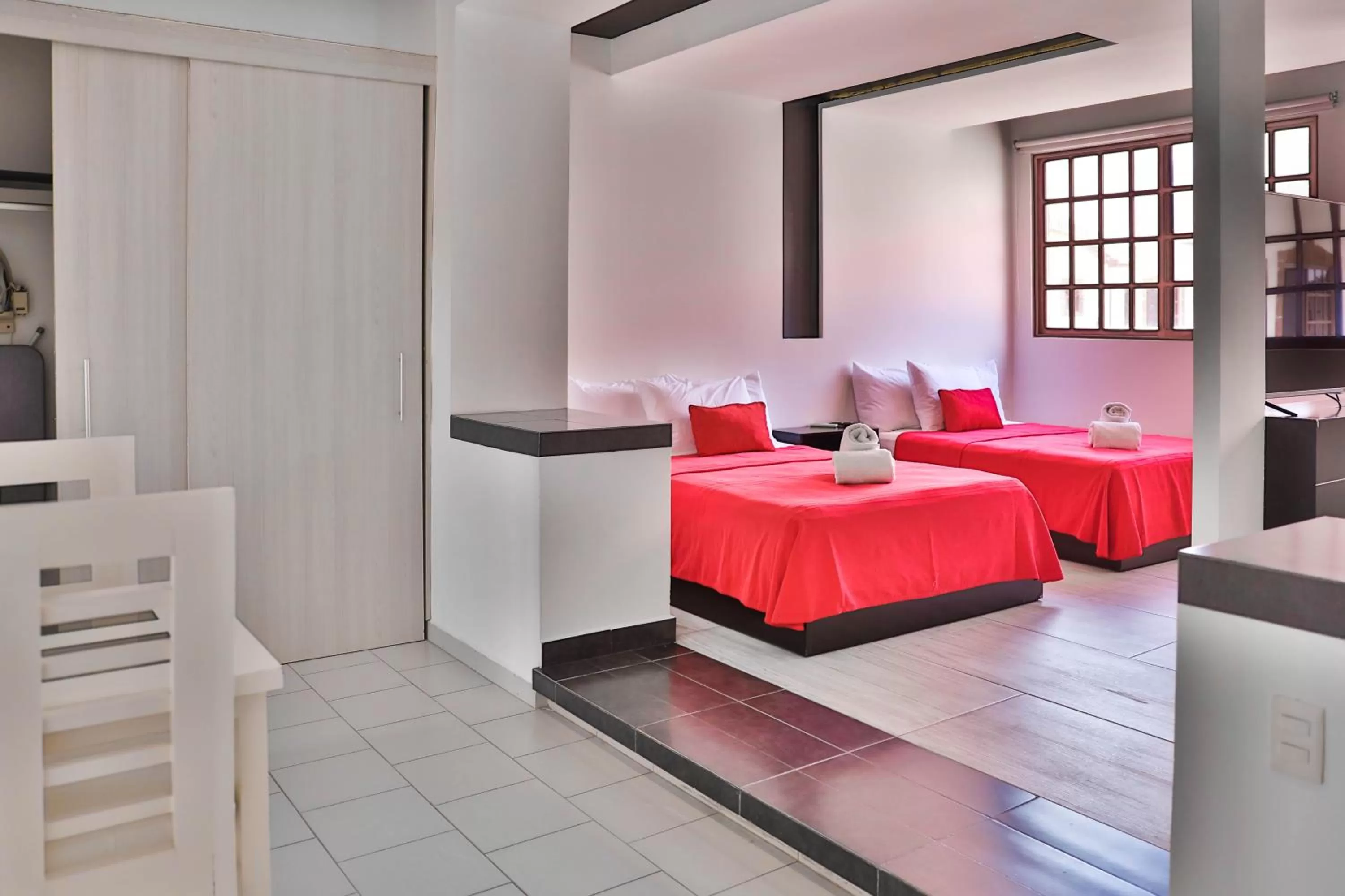 Photo of the whole room, Bed in Hotel Colonial Playa del Carmen