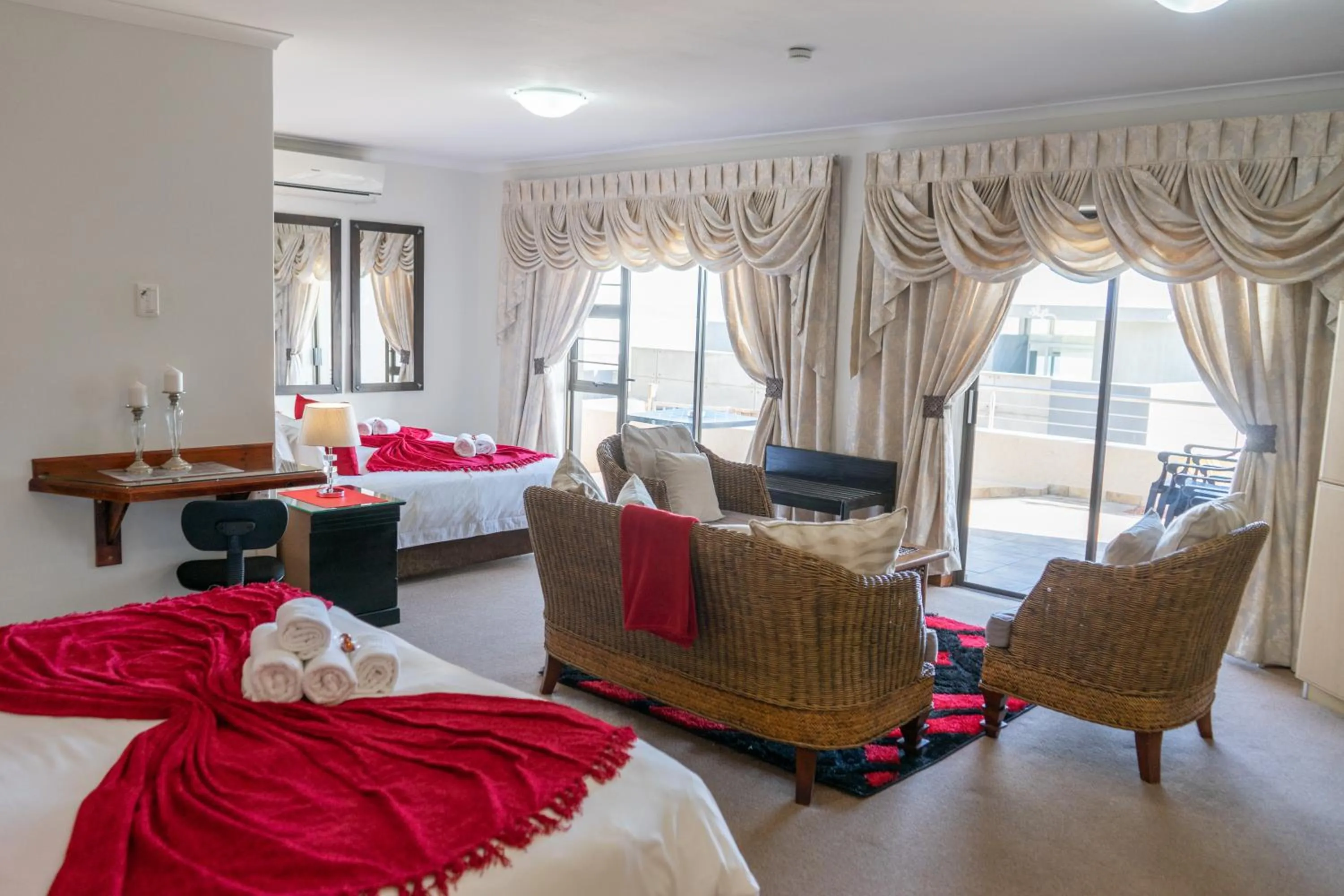 Seating area, Bed in Bar-t-nique Guest House