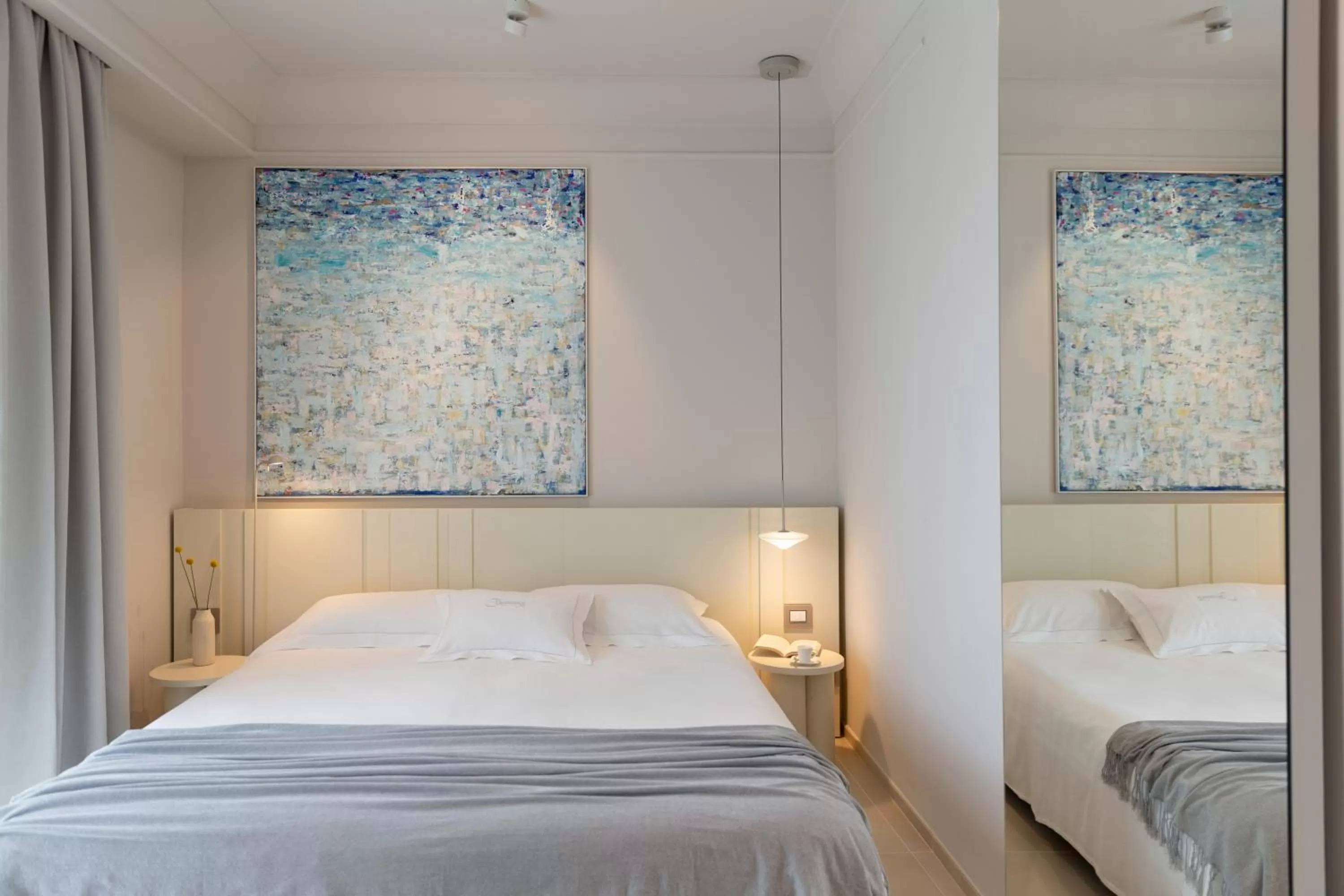 Bed in Taodomus Boutique Hotel