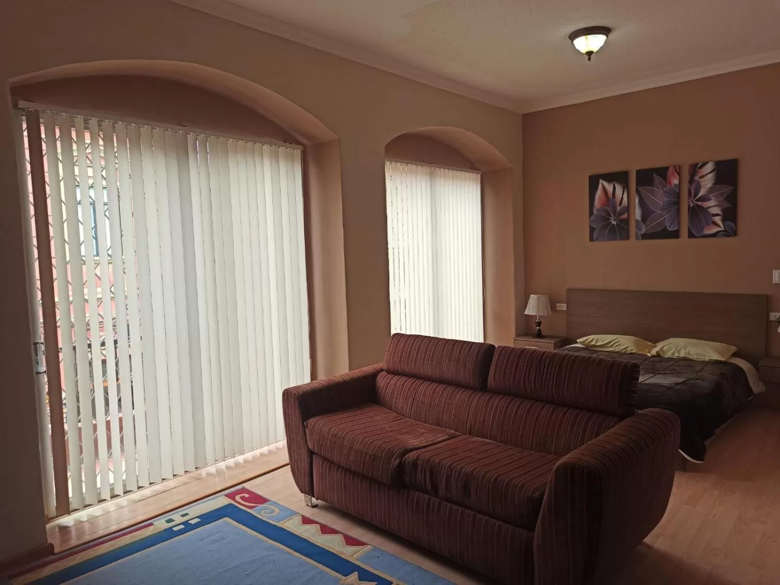 Bed, Seating Area in Casa San Benito Hospedaje