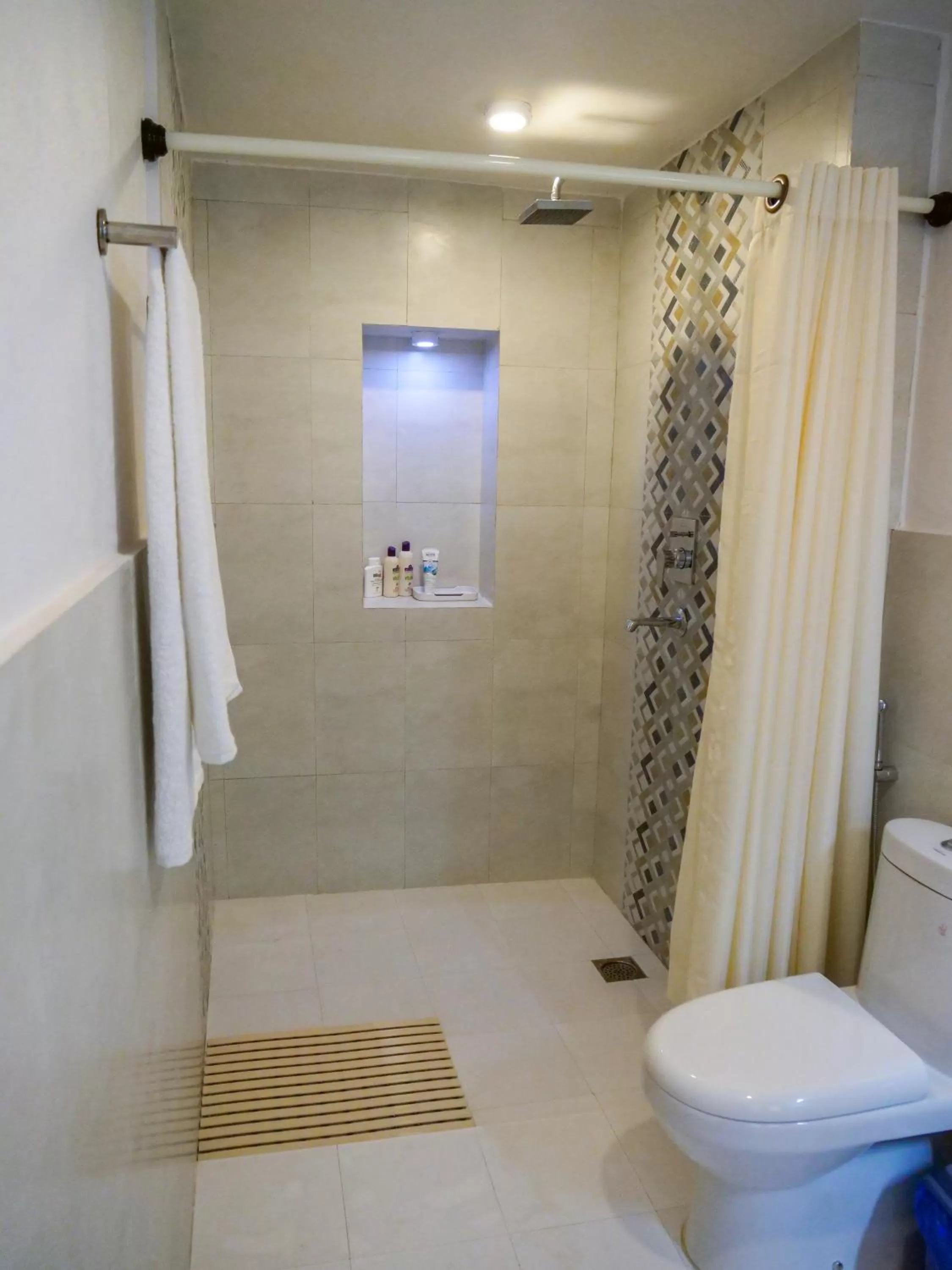 Bathroom in Omana Hotel