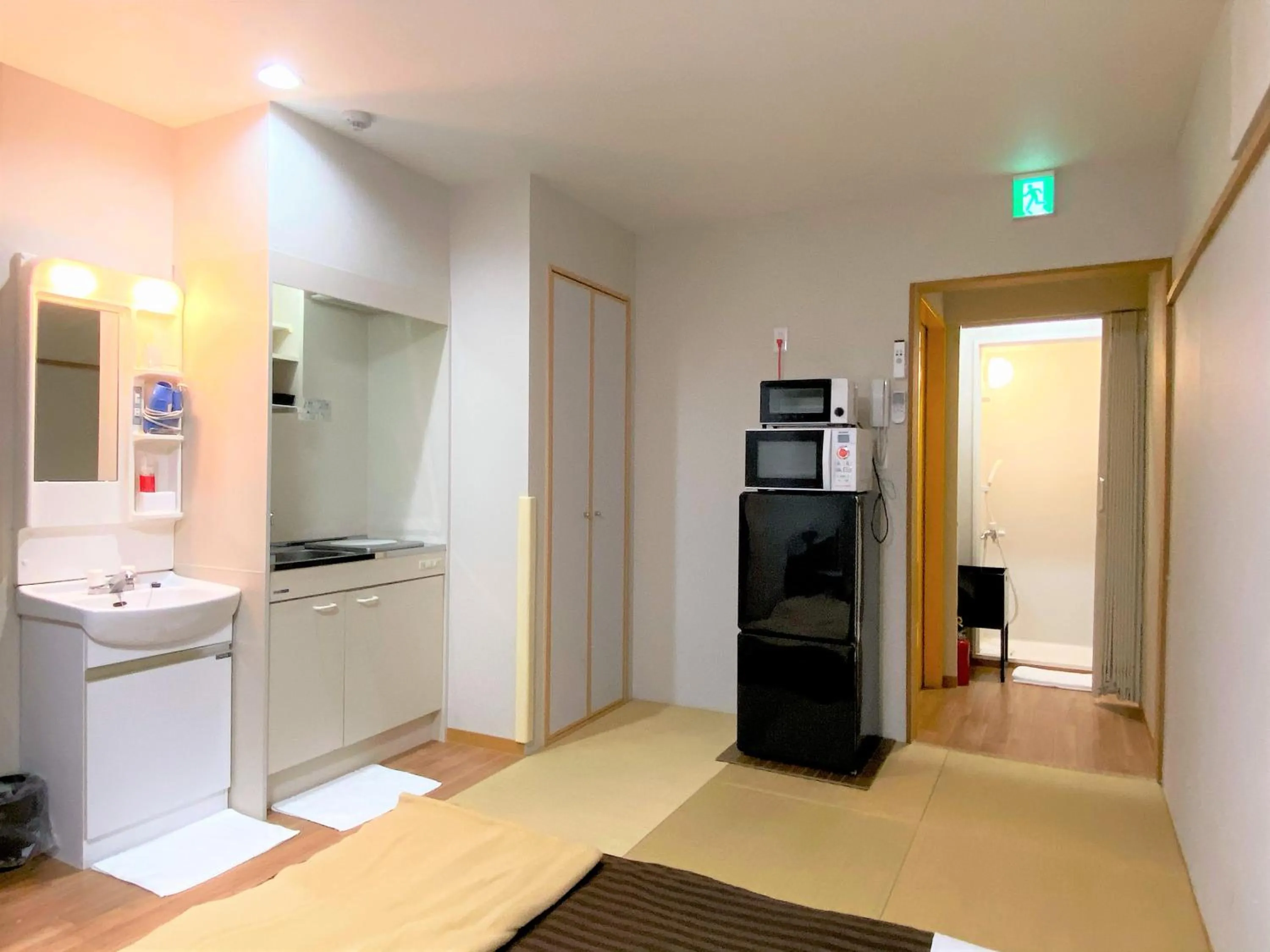 Kitchen or kitchenette in Sakura Hotel Hatagaya