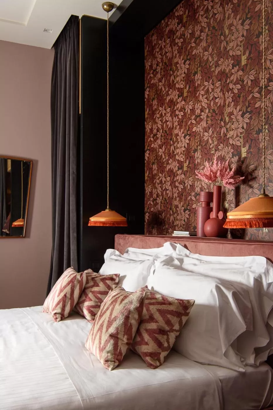 Bed in Velona's Jungle Luxury Suites