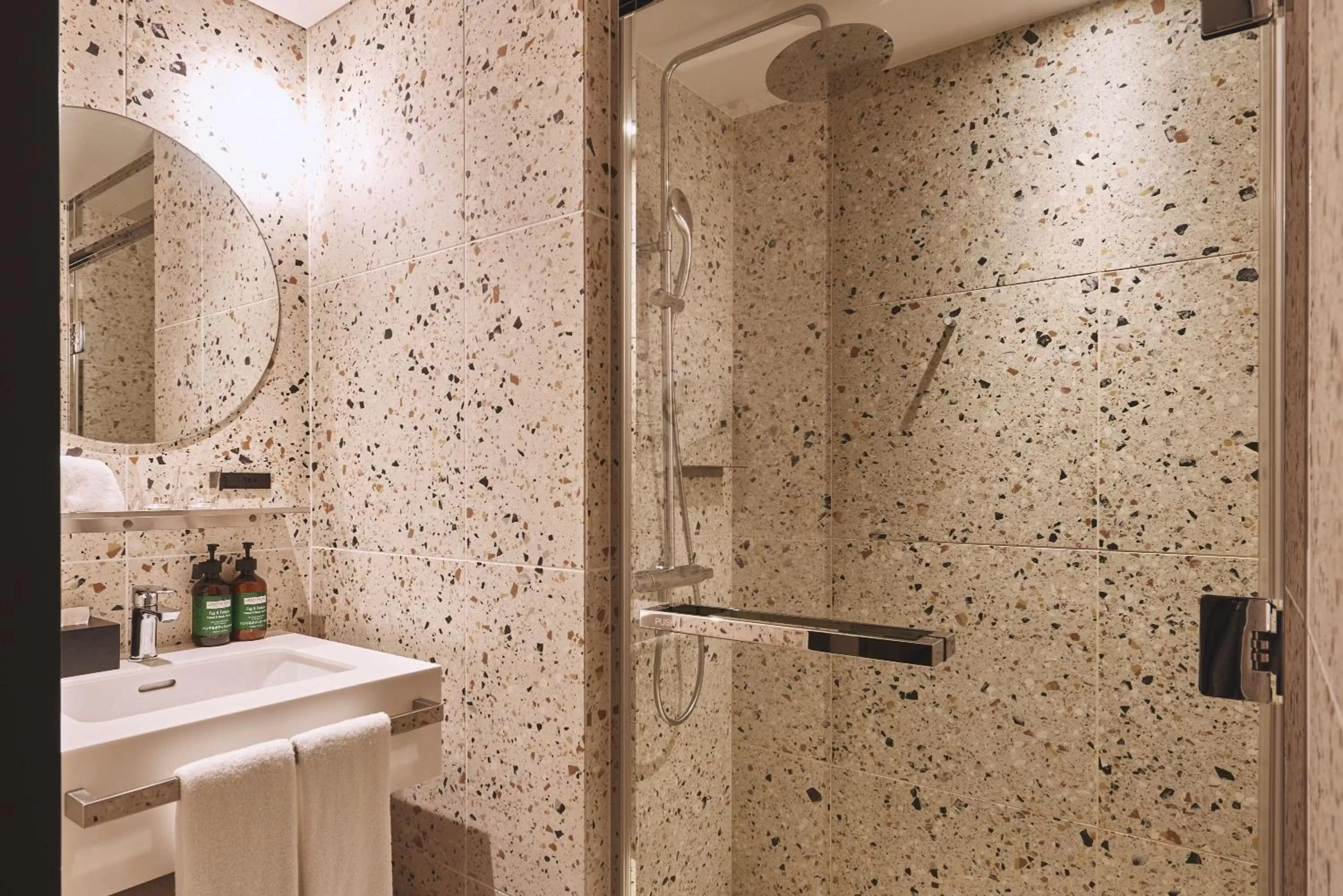 Bathroom in voco Osaka Central by IHG