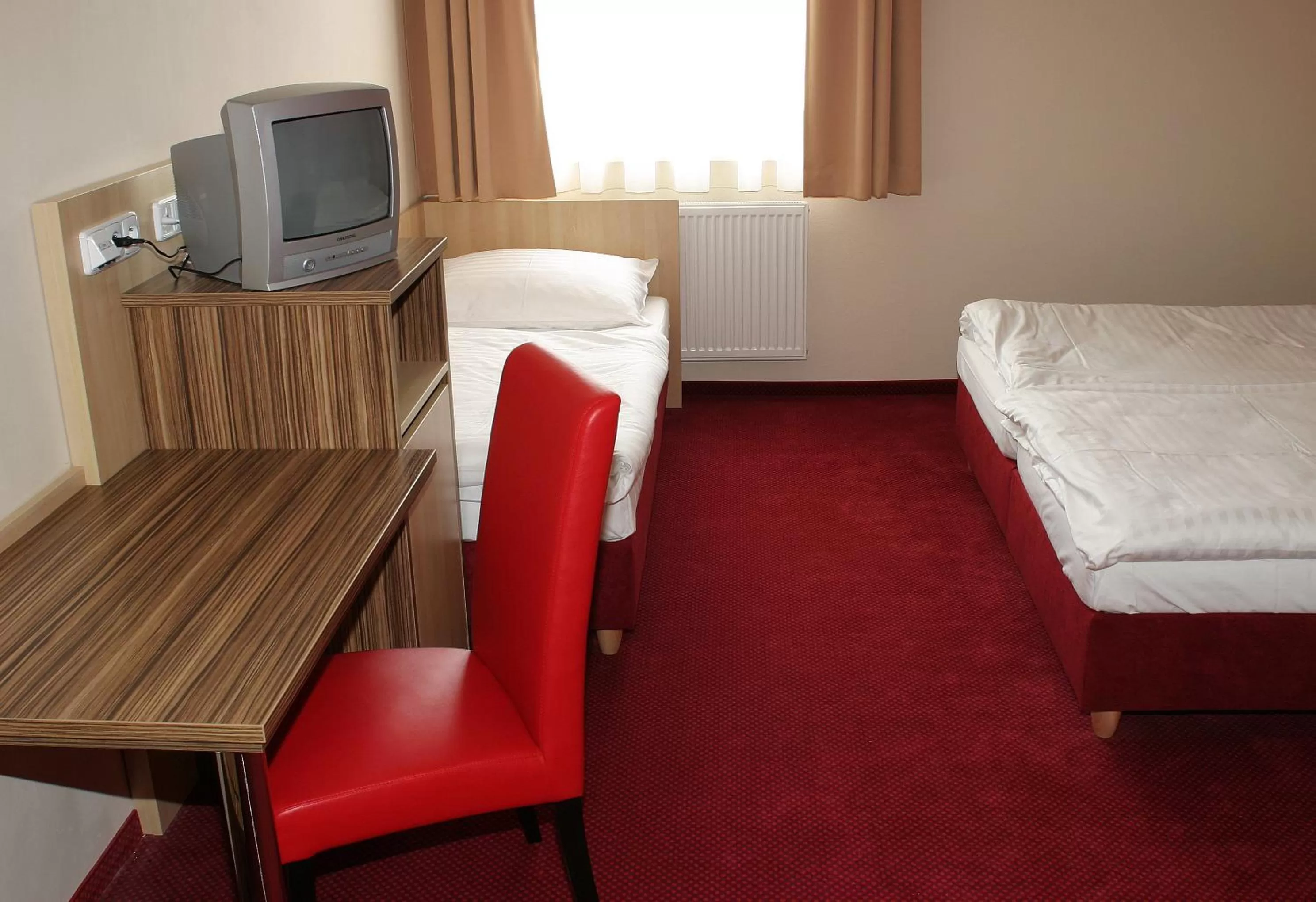 Bedroom, TV/Entertainment Center in Hotel U Divadla