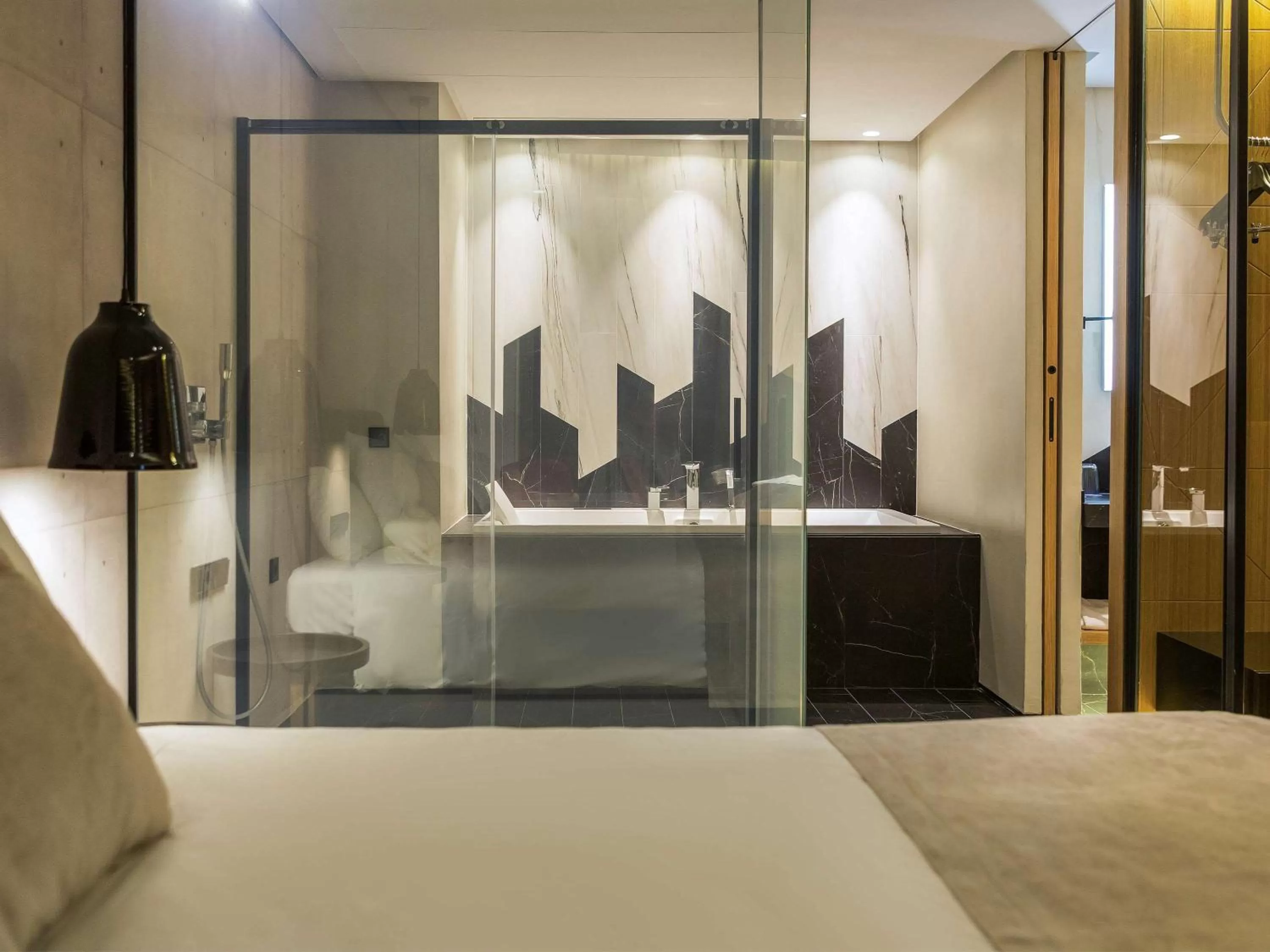 Bathroom, Bed in Novotel Sevilla