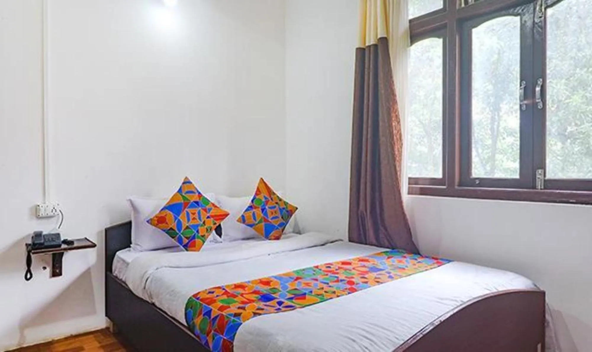 Property building, Bed in FabExpress Laxmi Niwas
