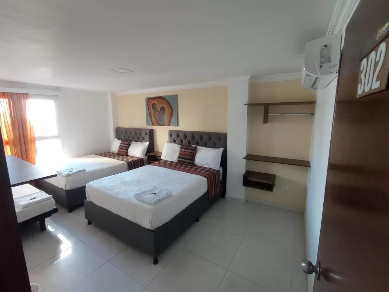 Bed in ANAJIRAWAA HOTEL