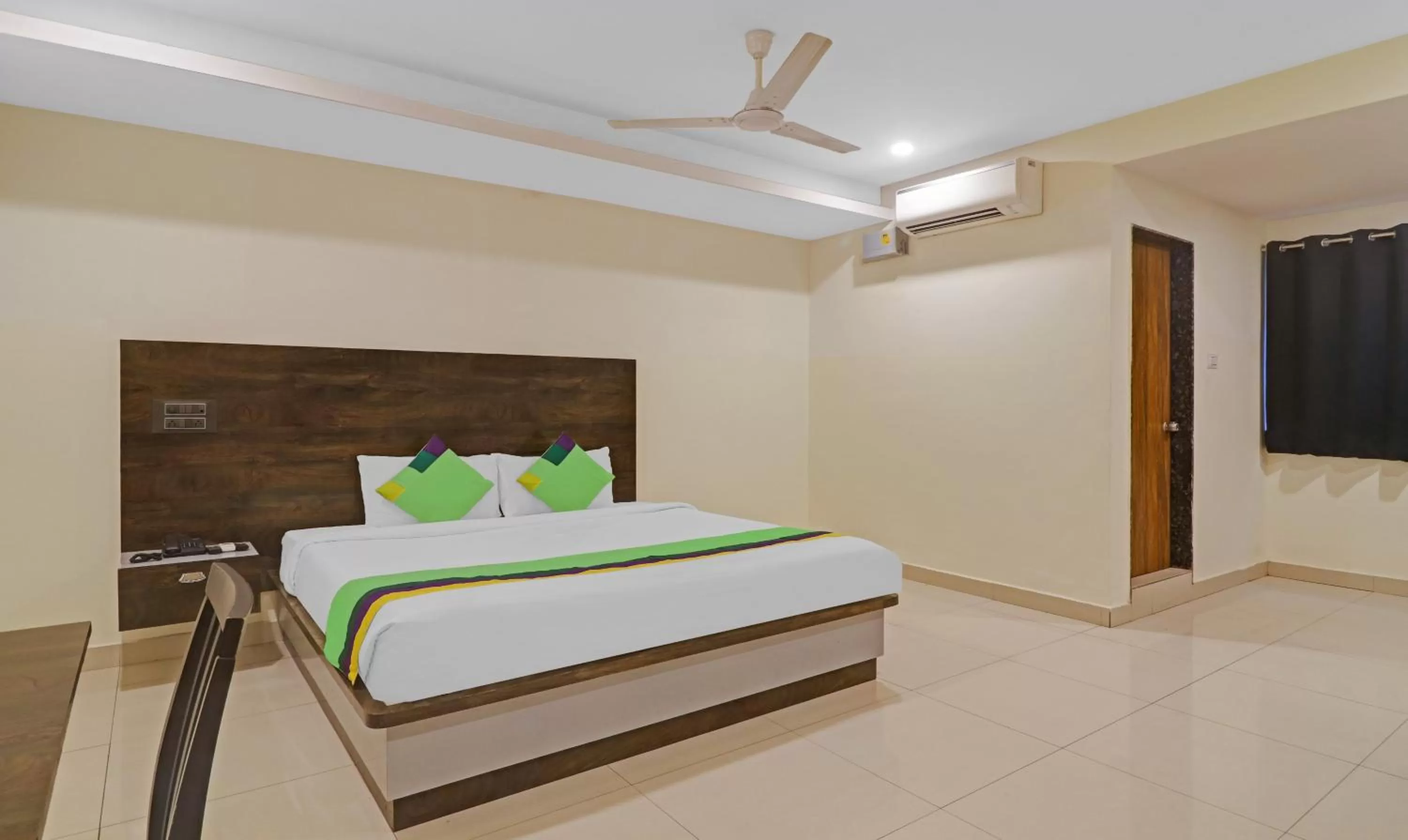 Bedroom, Bed in Treebo Trend Tee