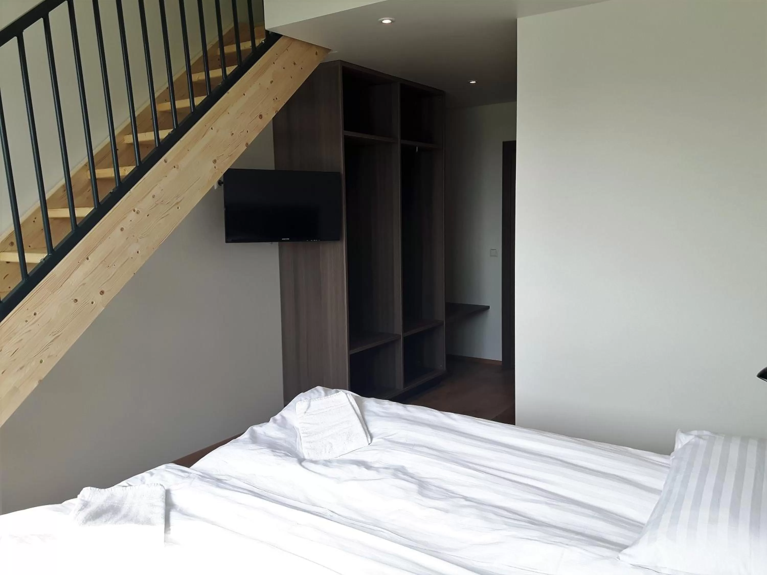 Photo of the whole room, Bed in Milk Factory