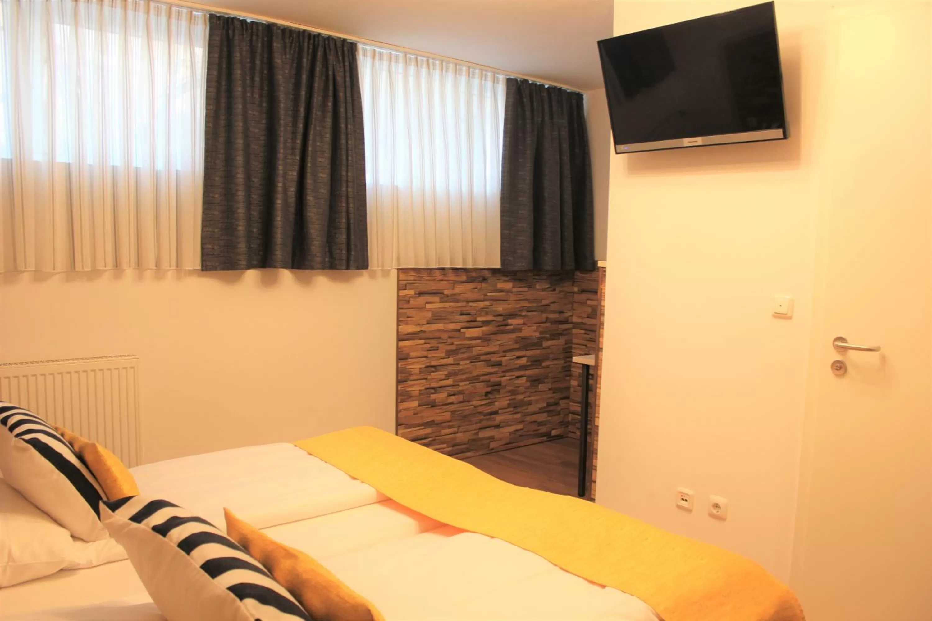 Photo of the whole room, Bed in Am Blumenhaus