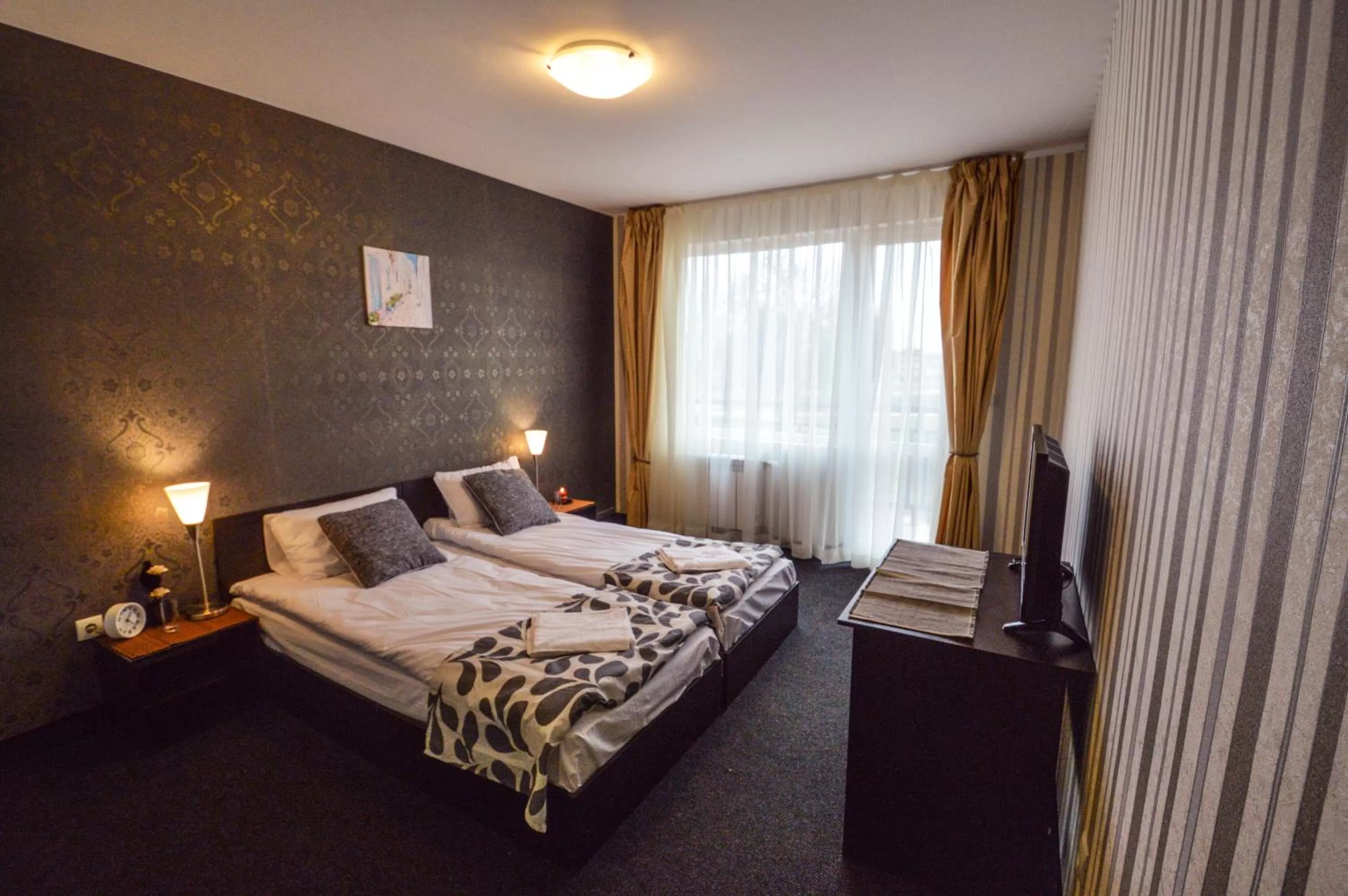 Bed in Elite Spetema Hotel