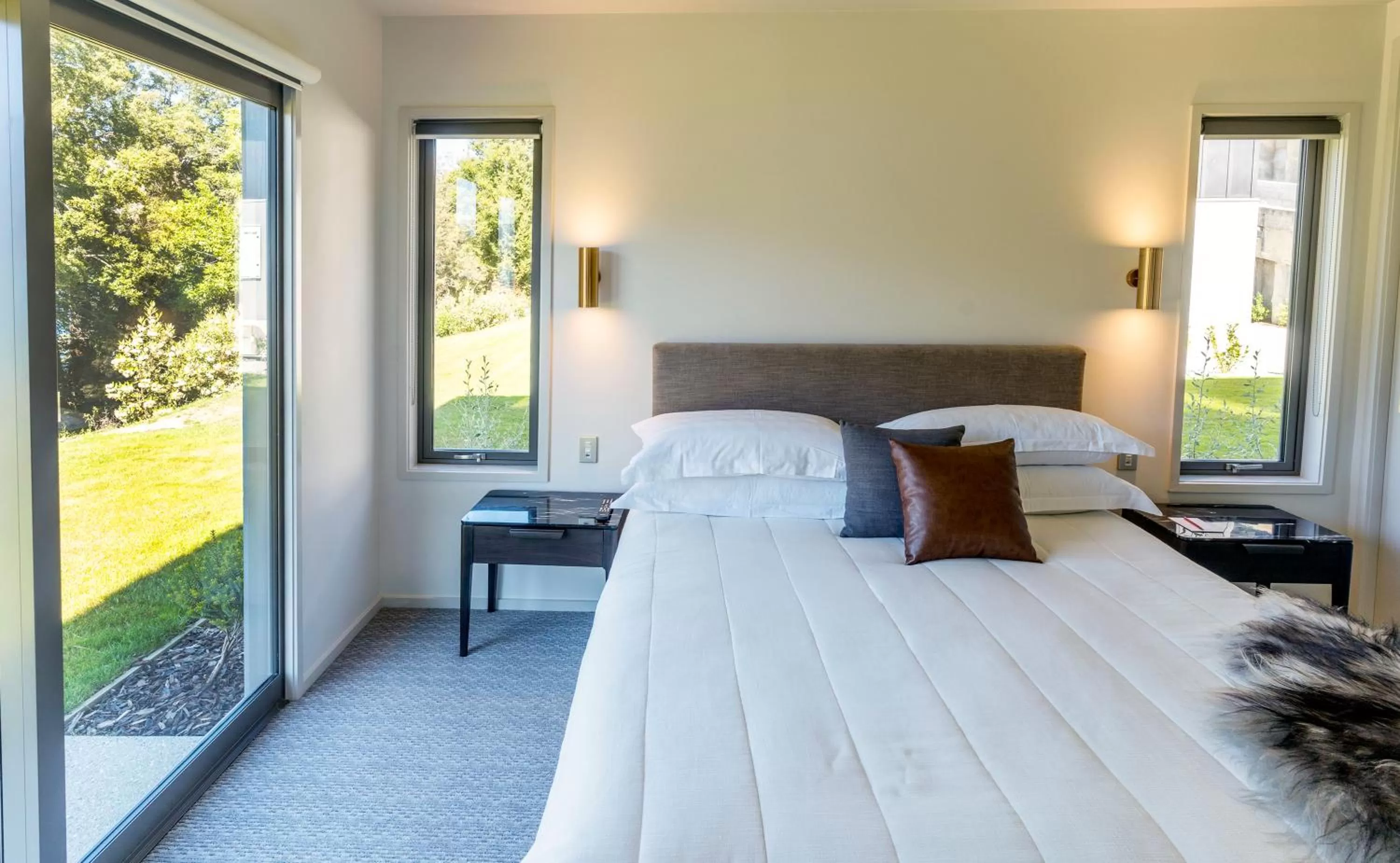 Bed in The Rees Hotel & Luxury Apartments